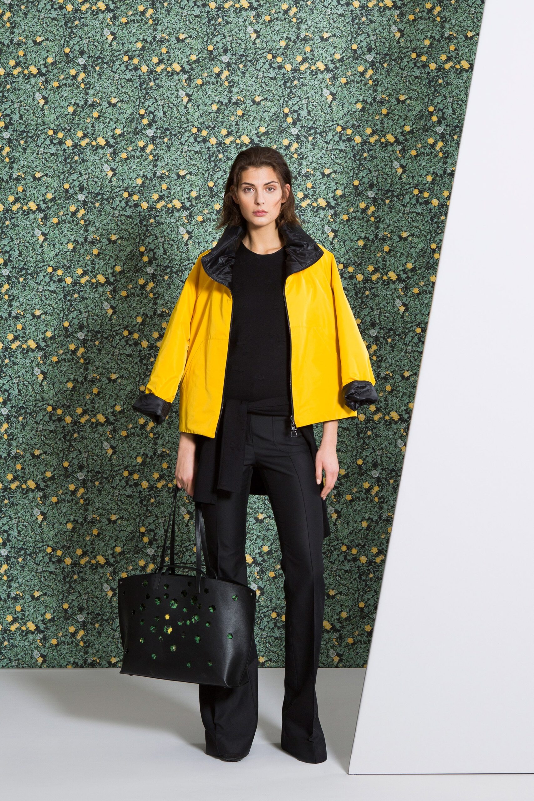 yellow vinyl jacket with black top