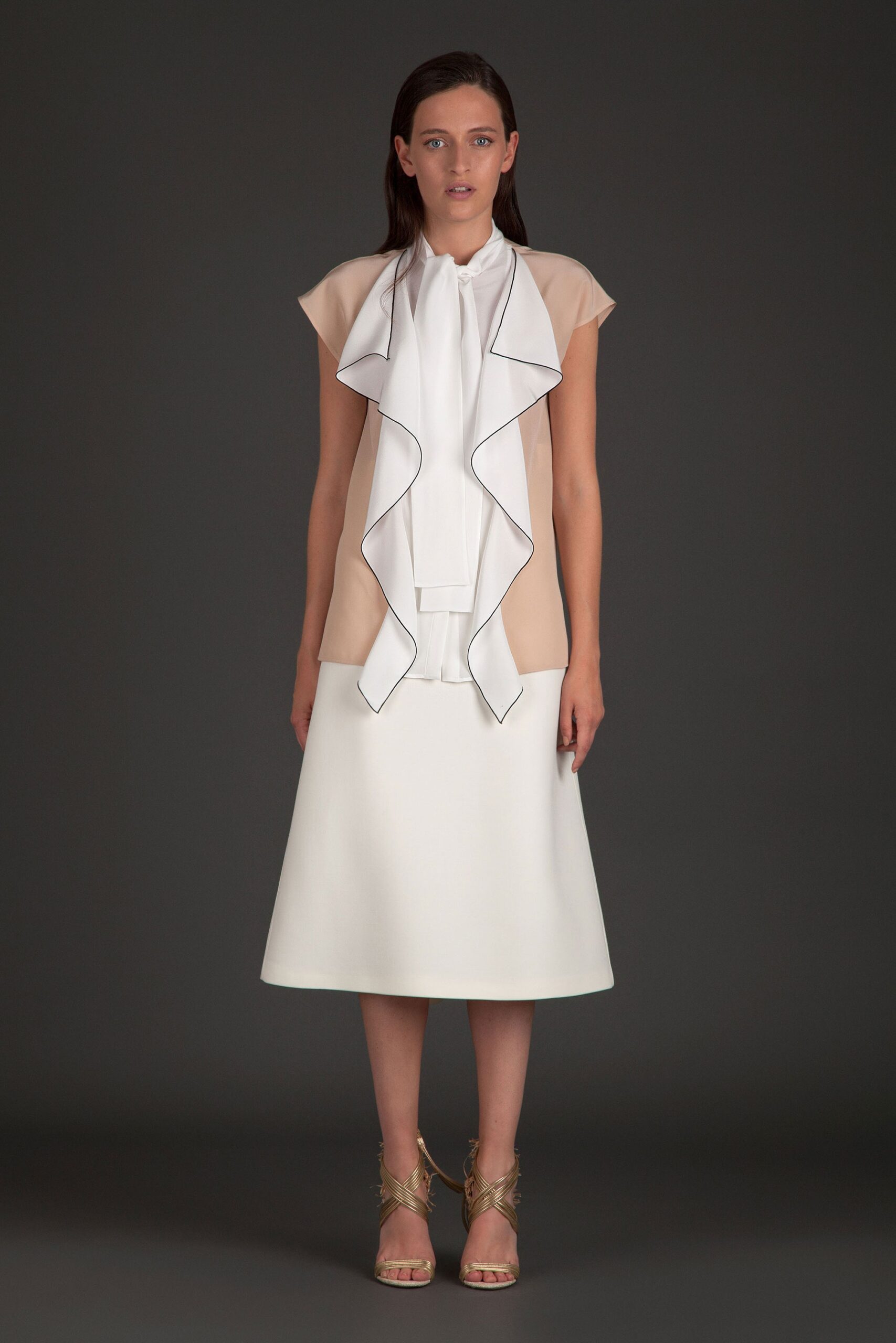 white silk blouse and midi skirt