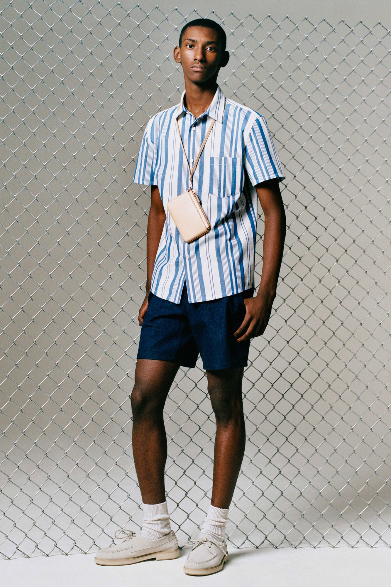 blue and white striped shirt with navy shorts