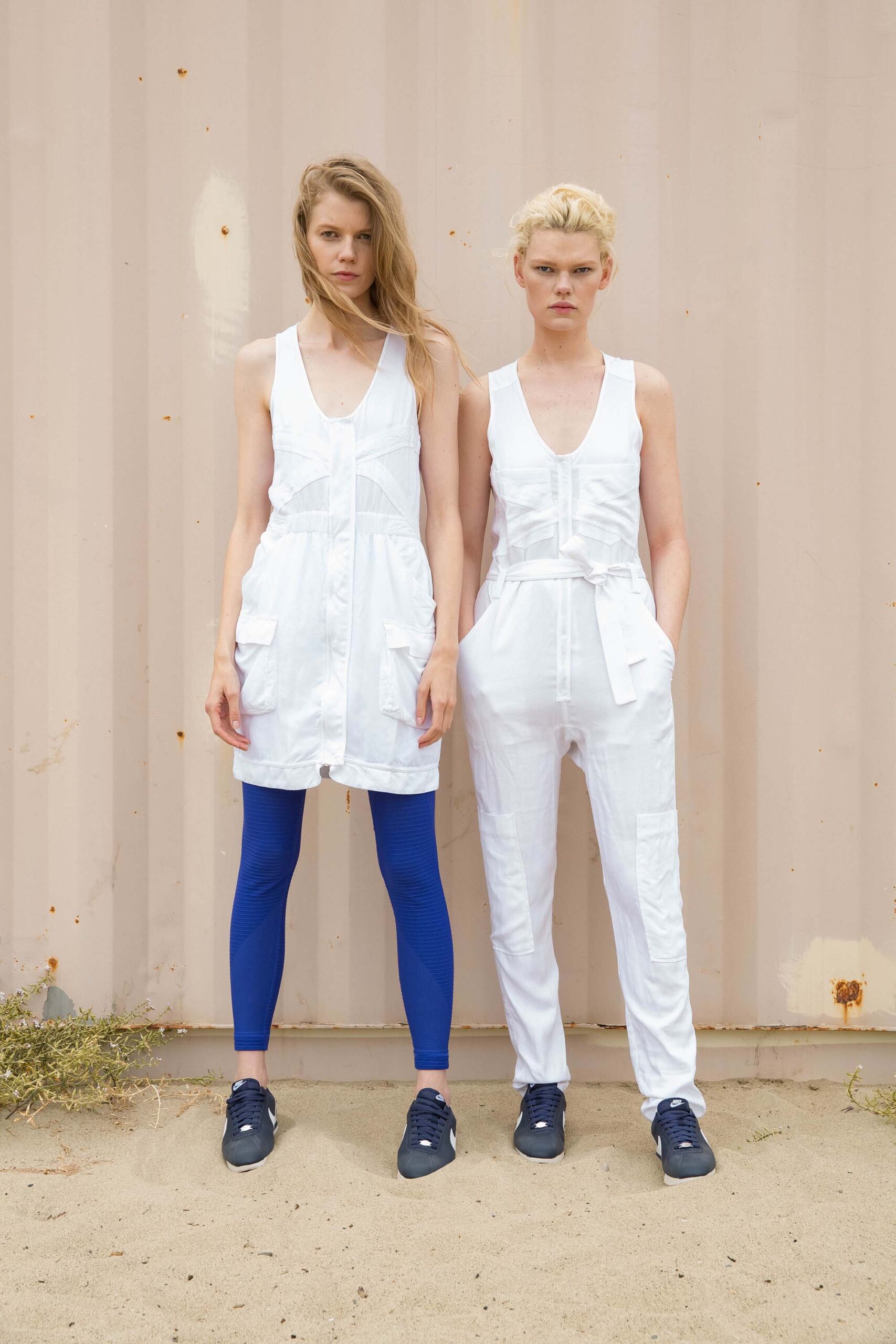 white cotton sleeveless dress and blue pants