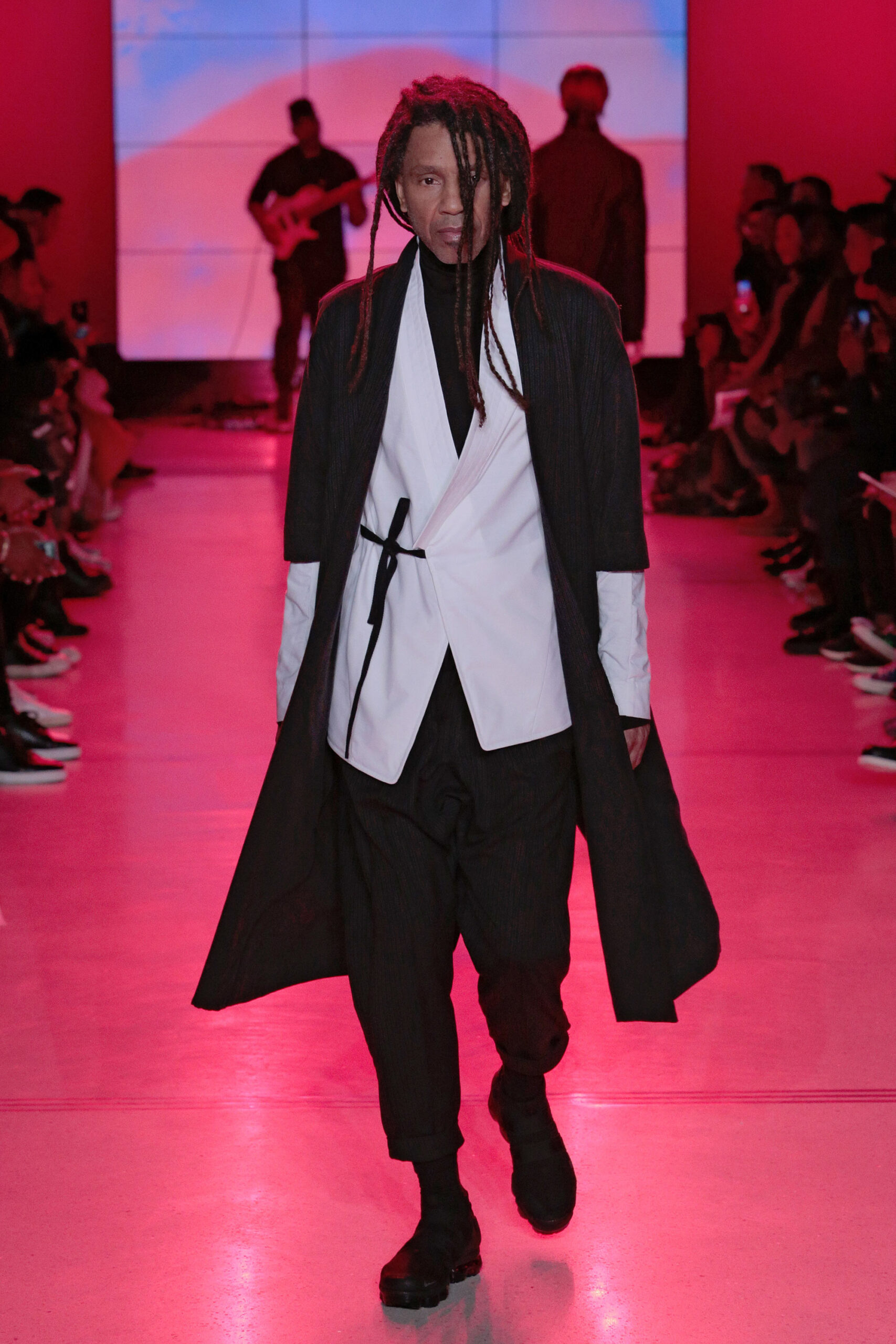 black coat white shirt black pants