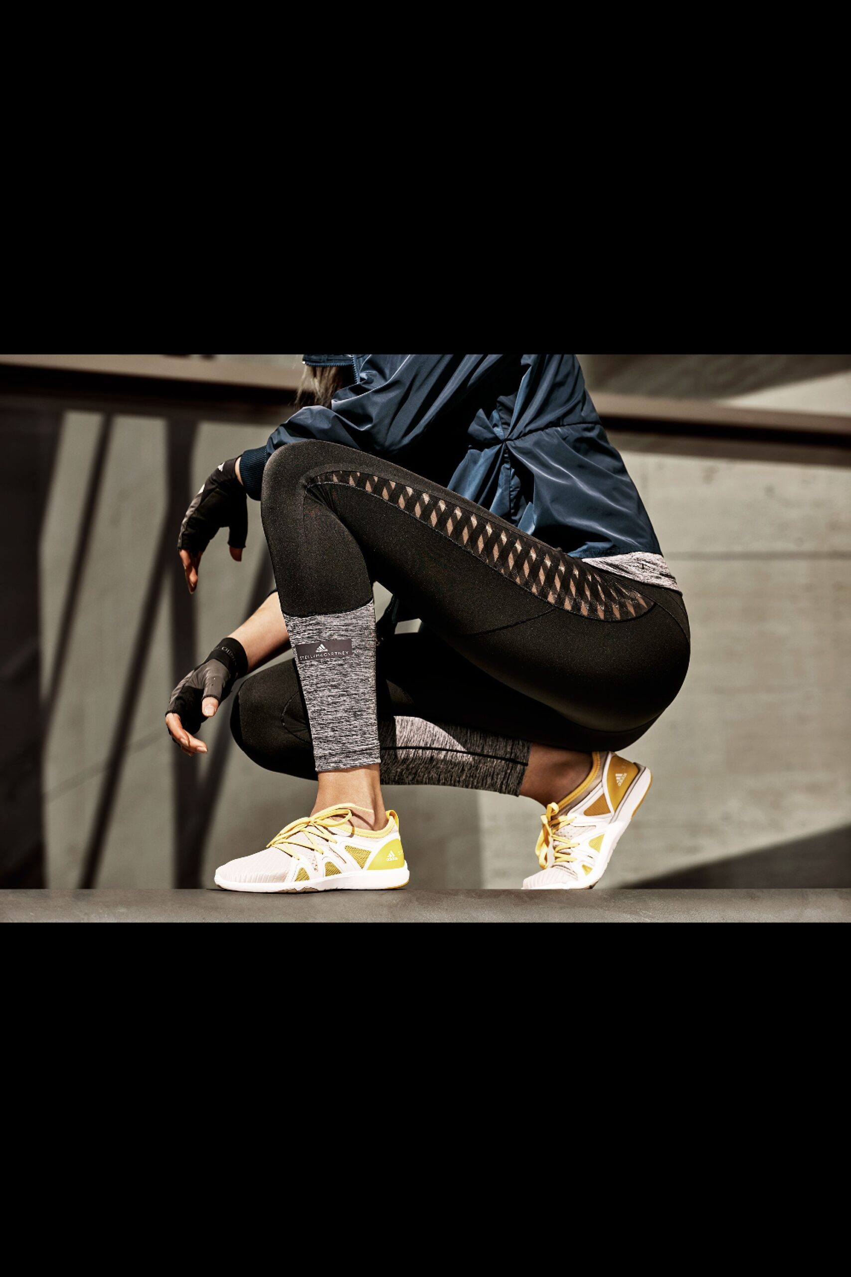 blue jacket with black leggings