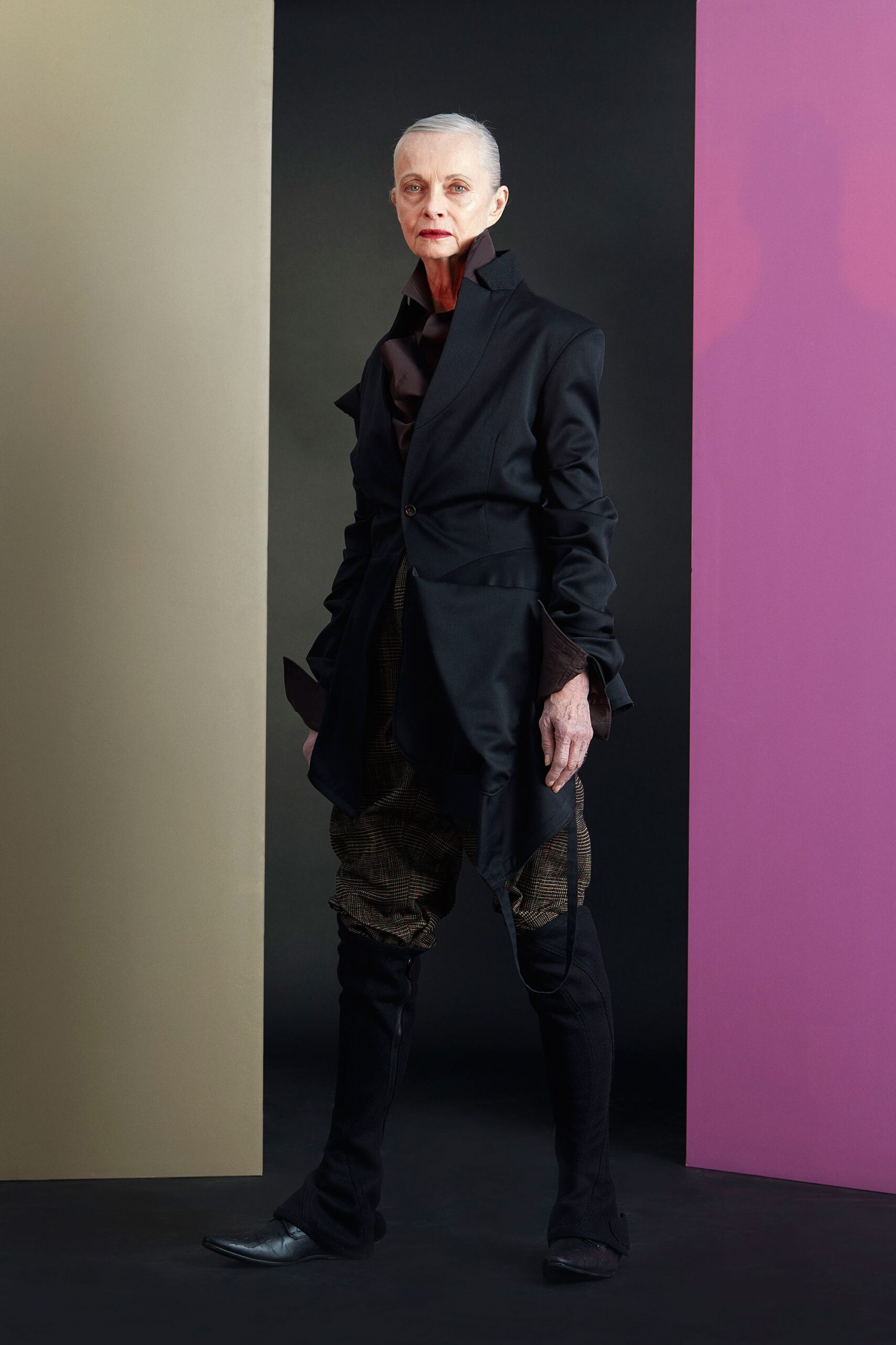 black blazer brown pleated pants