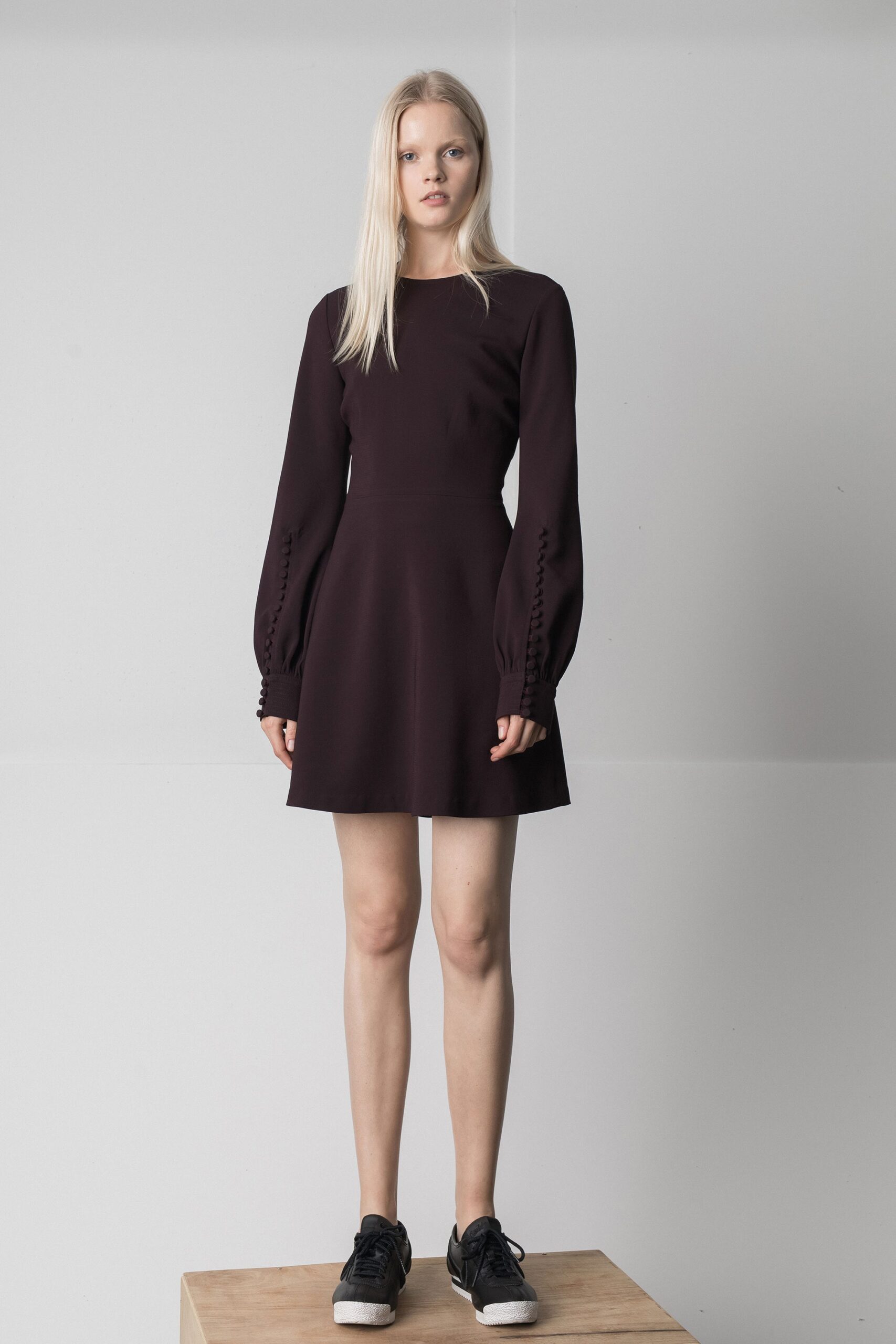purple mini dress with long sleeves