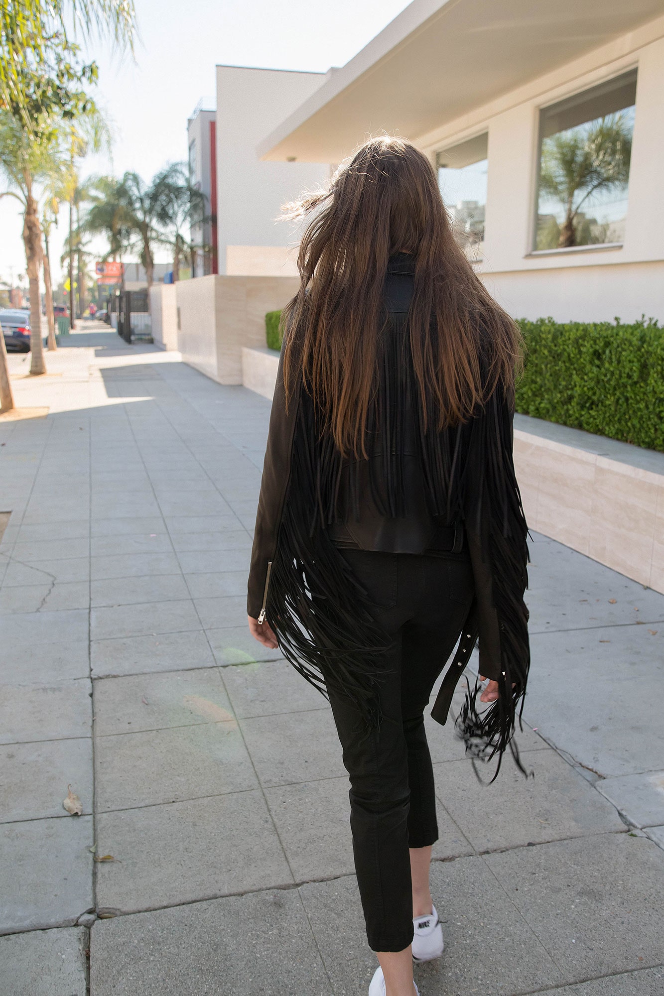 black leather fringed jacket