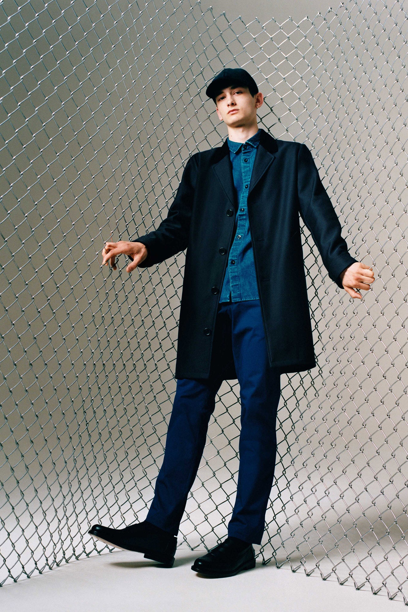 black wool coat with denim shirt