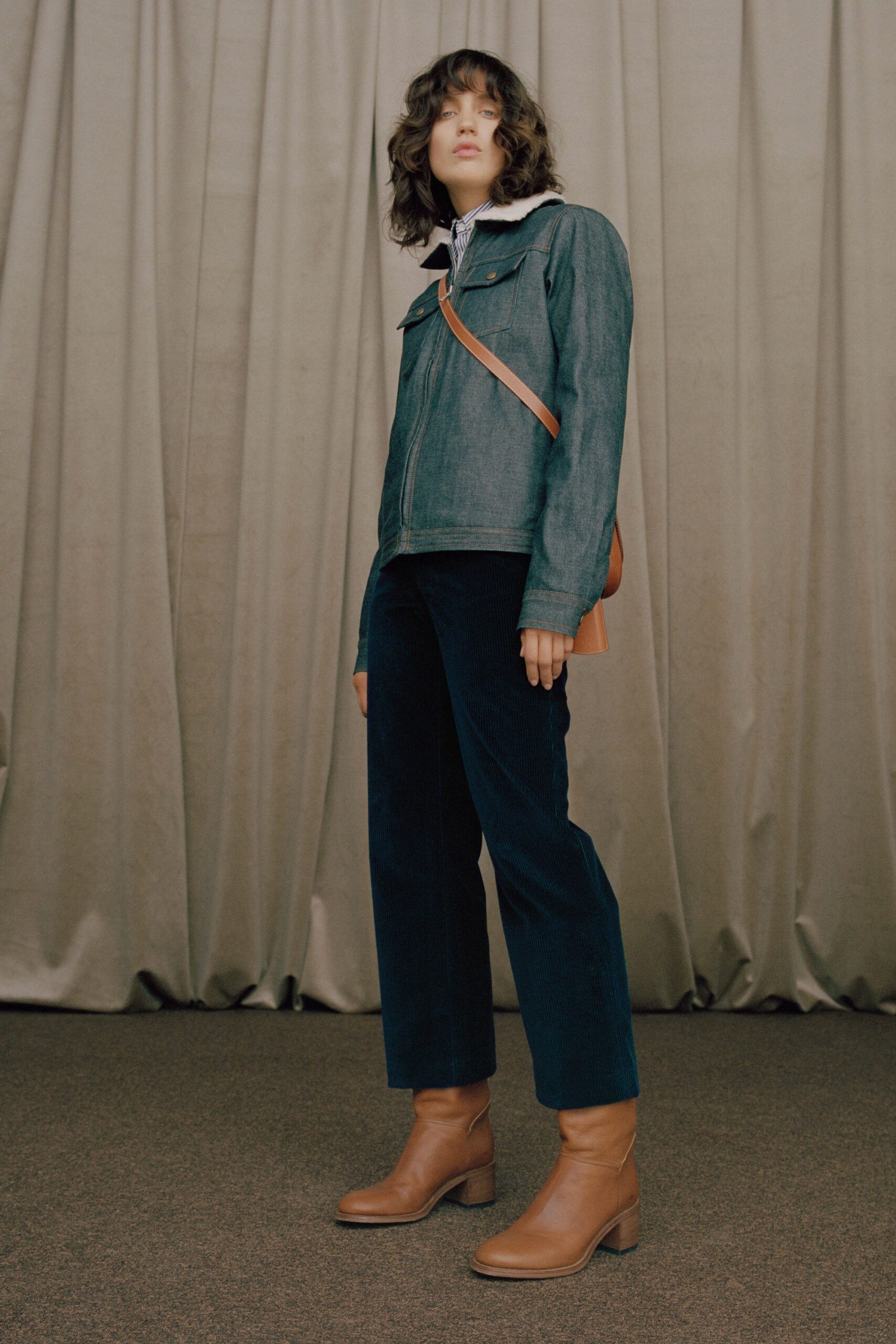 blue denim jacket with black pants
