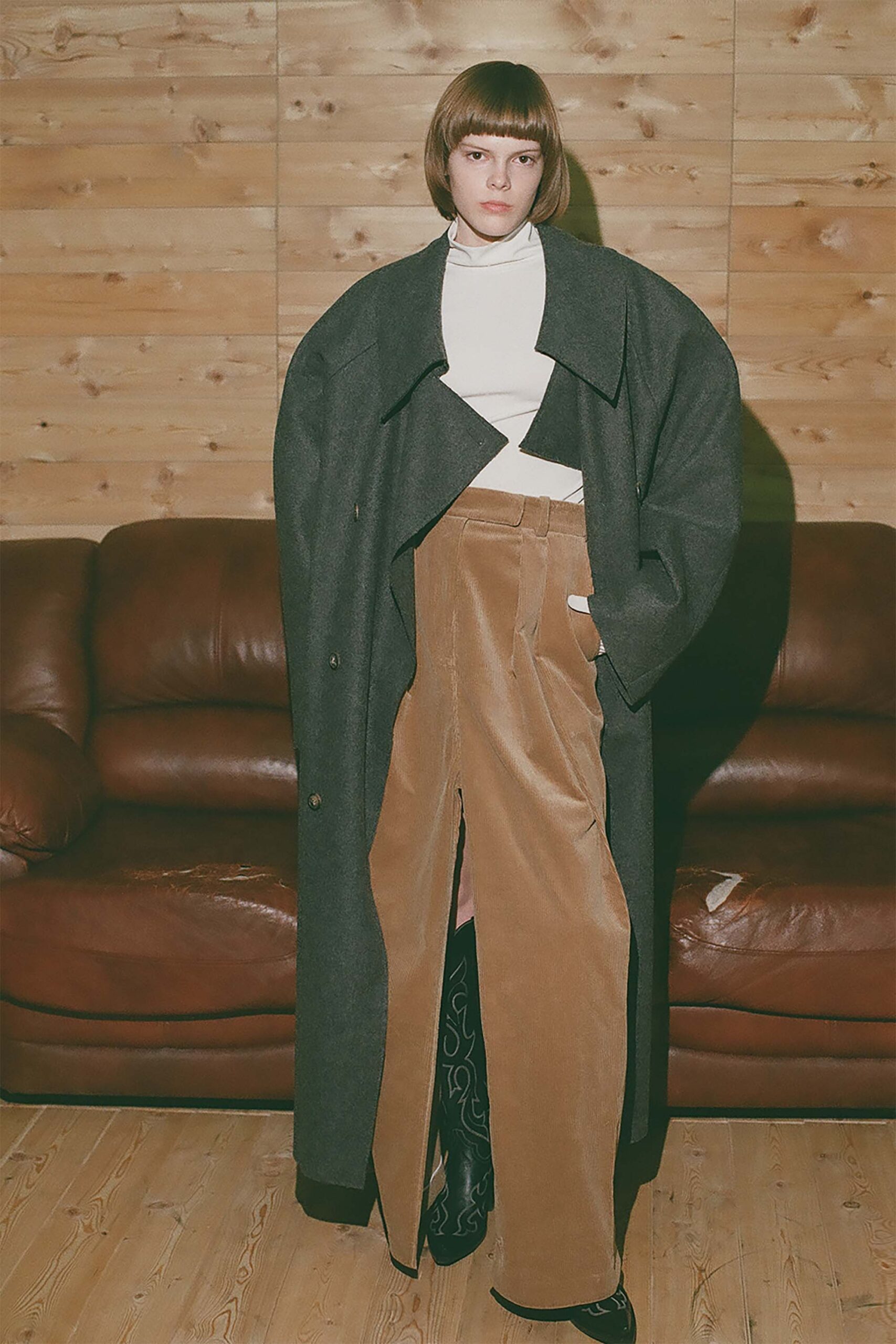 oversized gray wool coat with relaxed brown pants