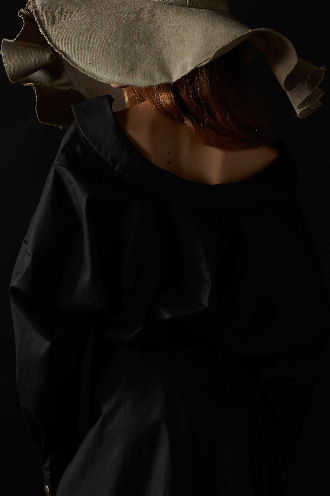 black cotton long-sleeve off-shoulder relaxed draped blouse