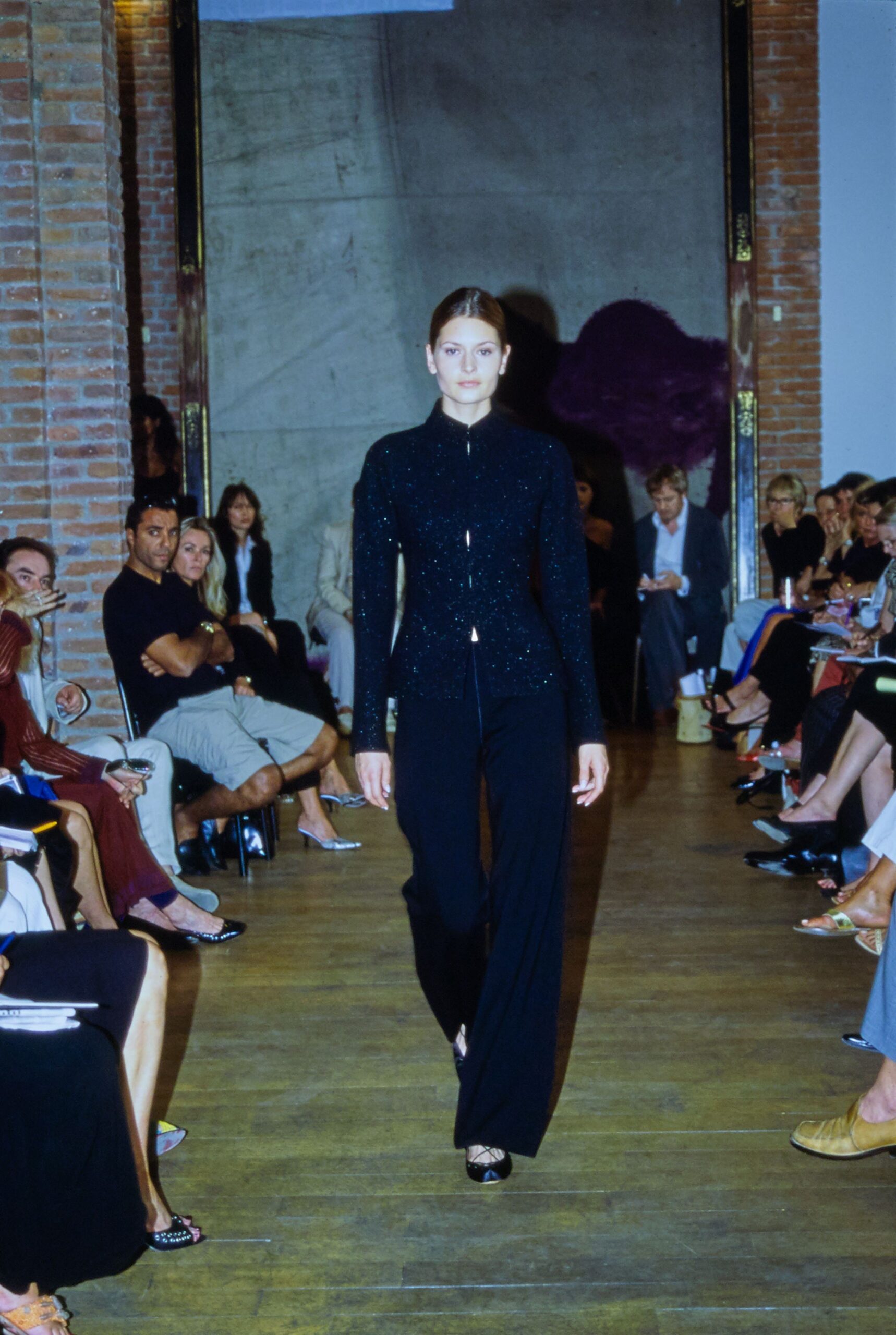 black sequined blazer and tailored pants