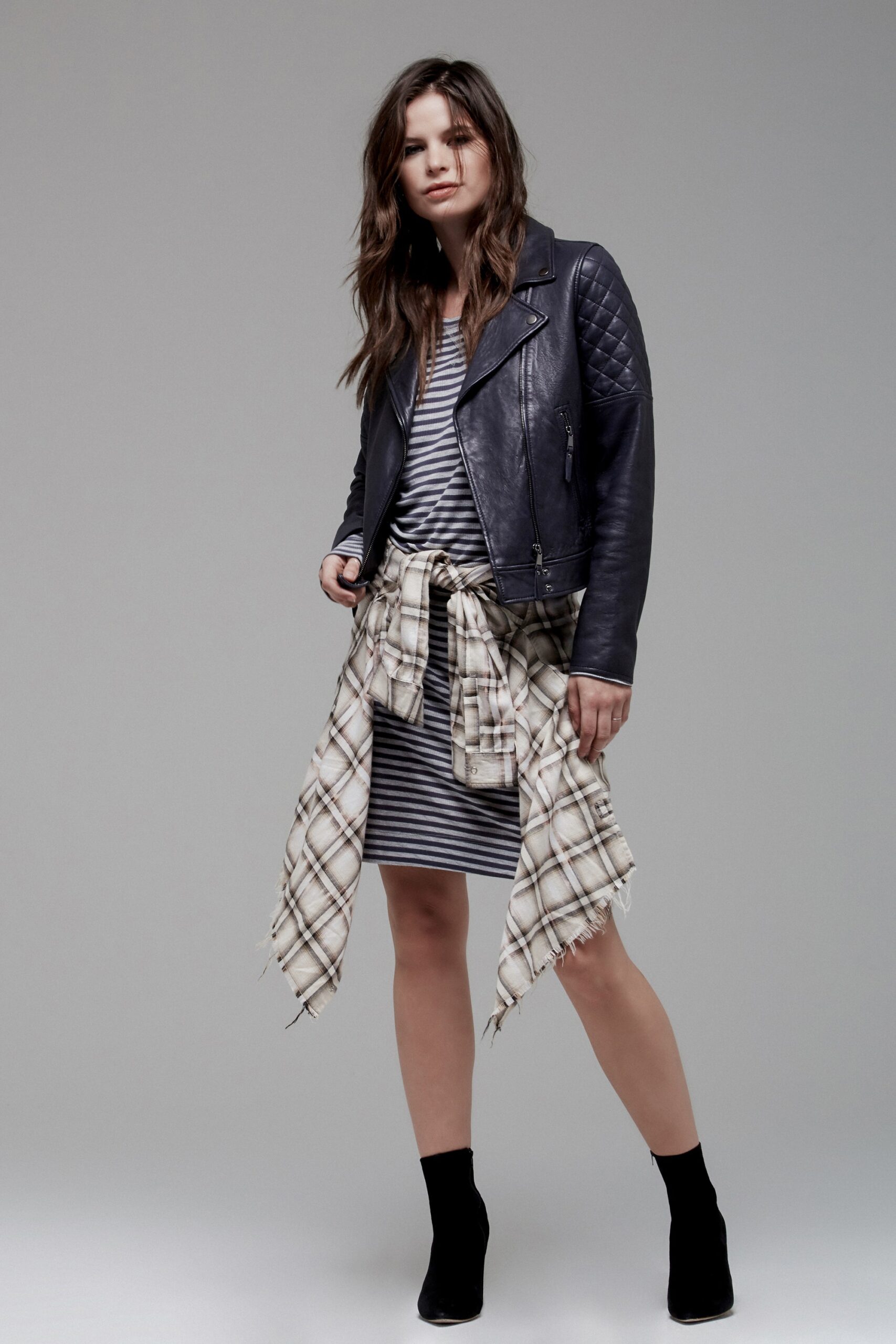 gray striped mini dress with leather jacket