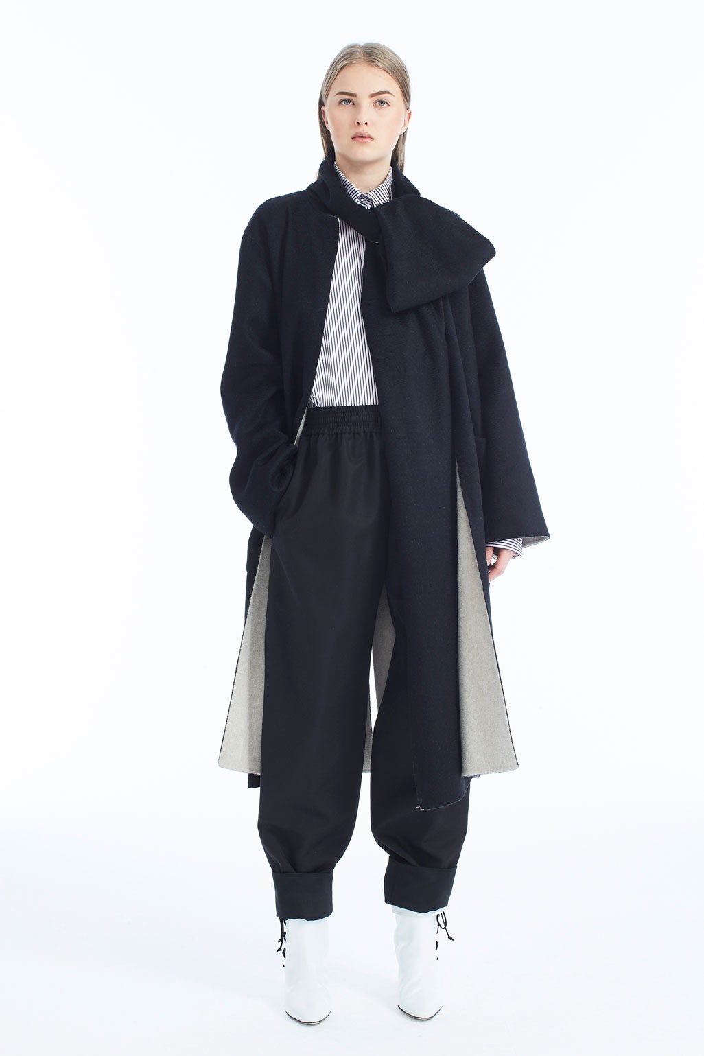 black wool coat with striped shirt