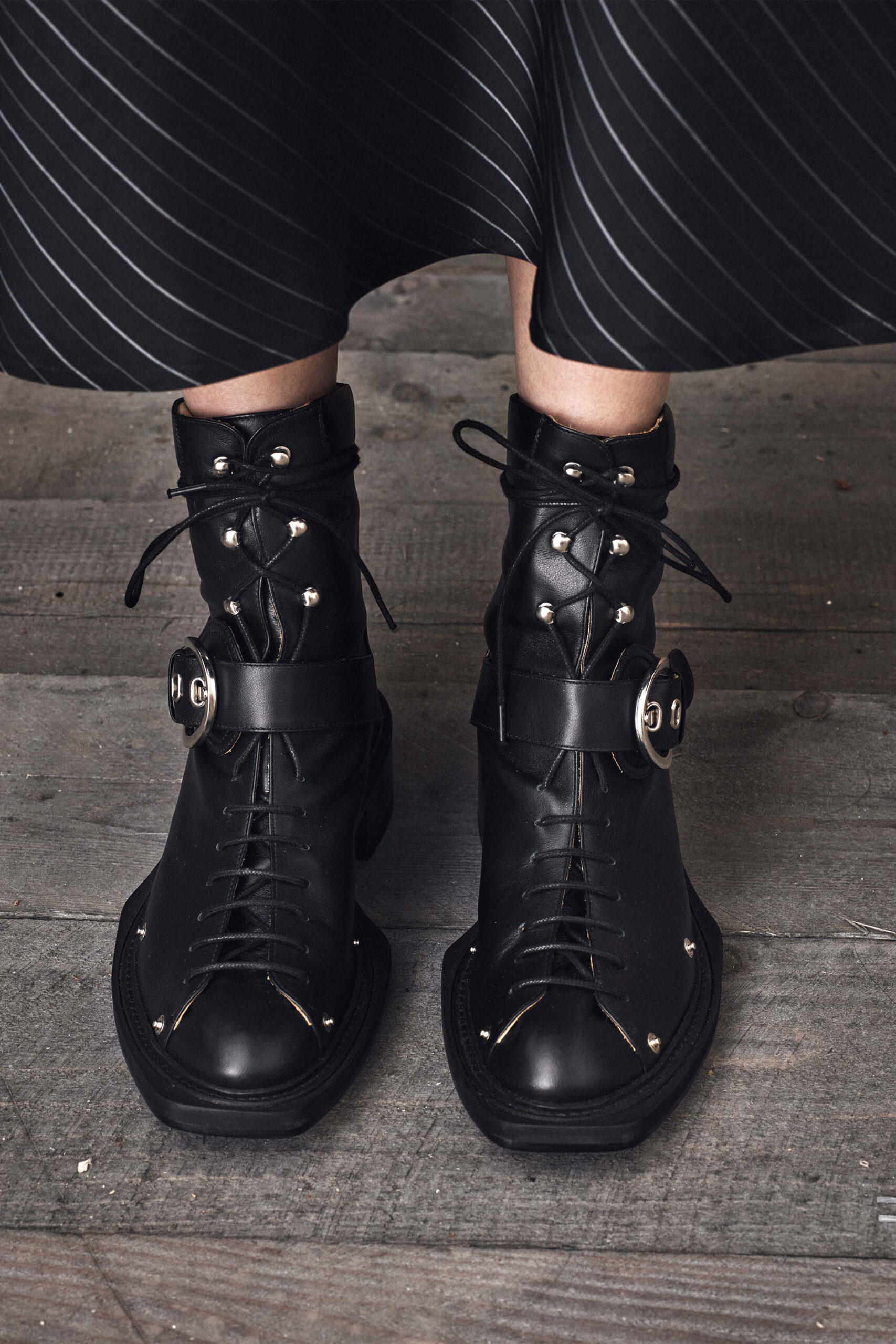 black leather spiked boots