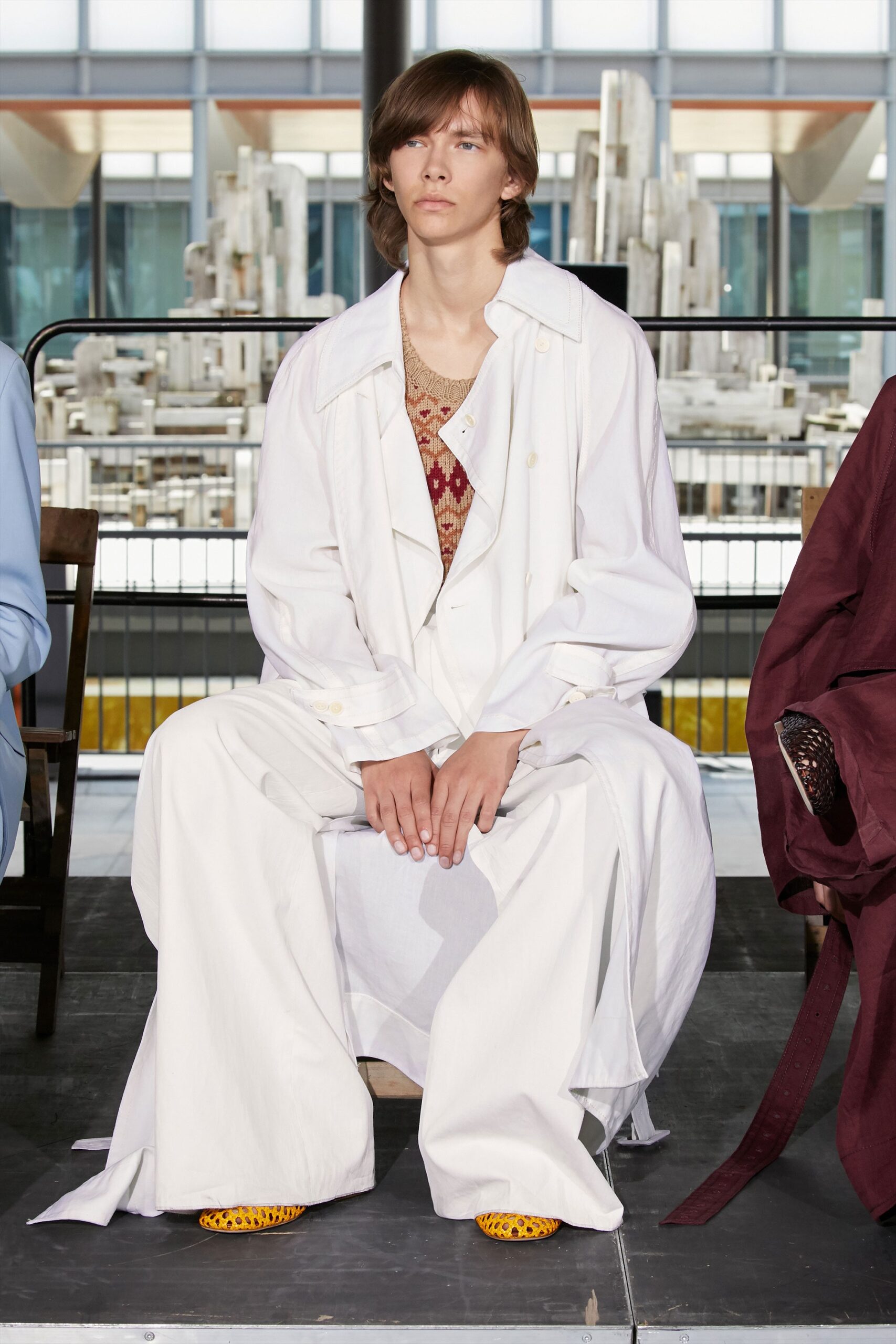 oversized white coat with relaxed pants