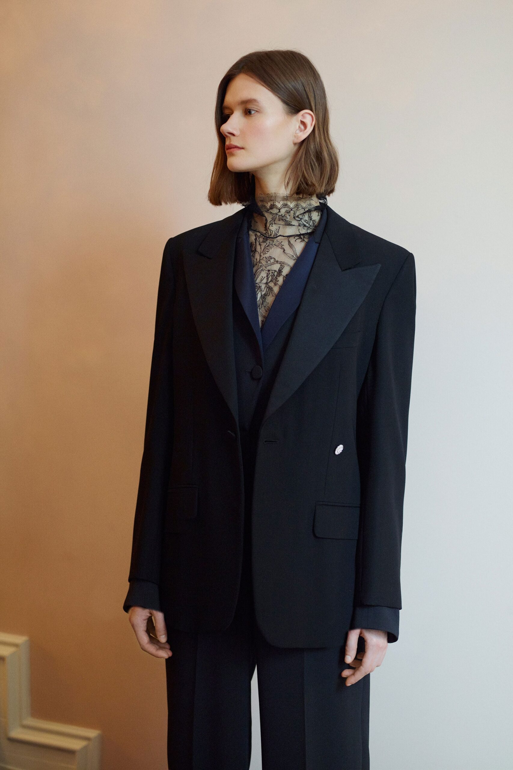 black tailored blazer and lace top