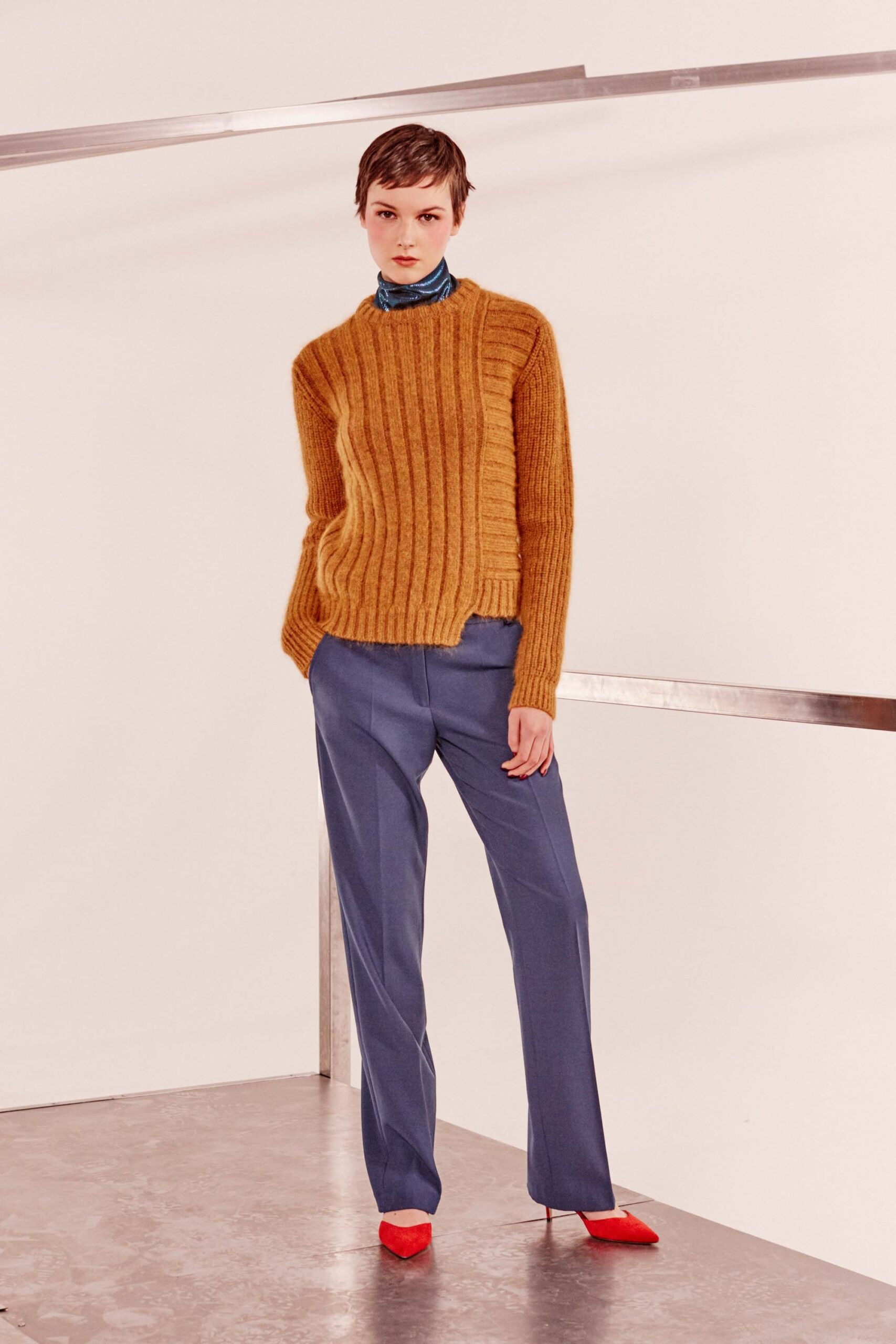 brown wool relaxed sweater with blue tailored pants