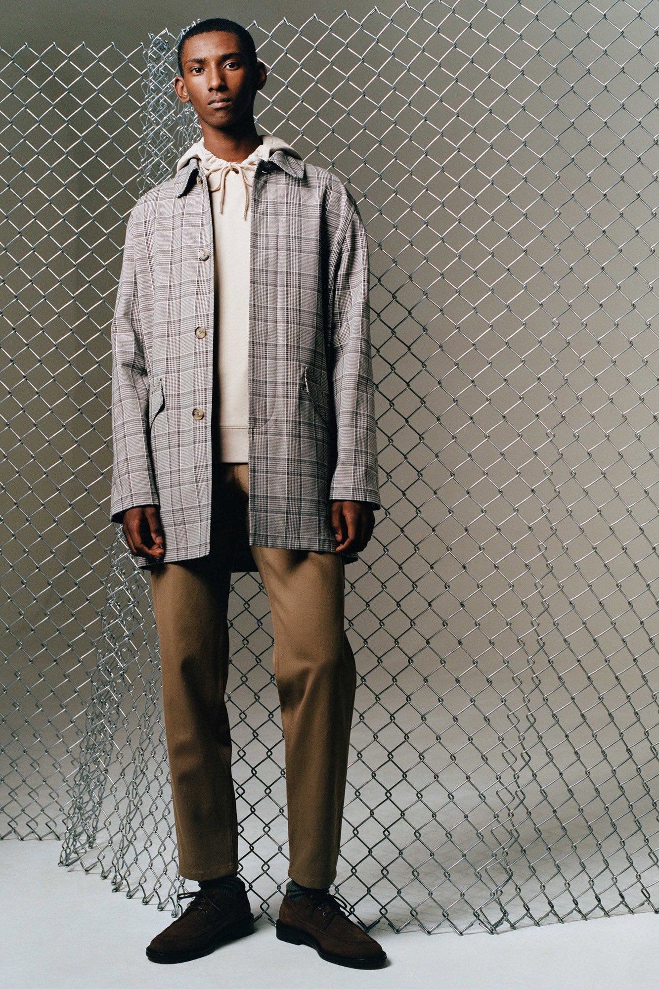 gray checked jacket with beige hoodie