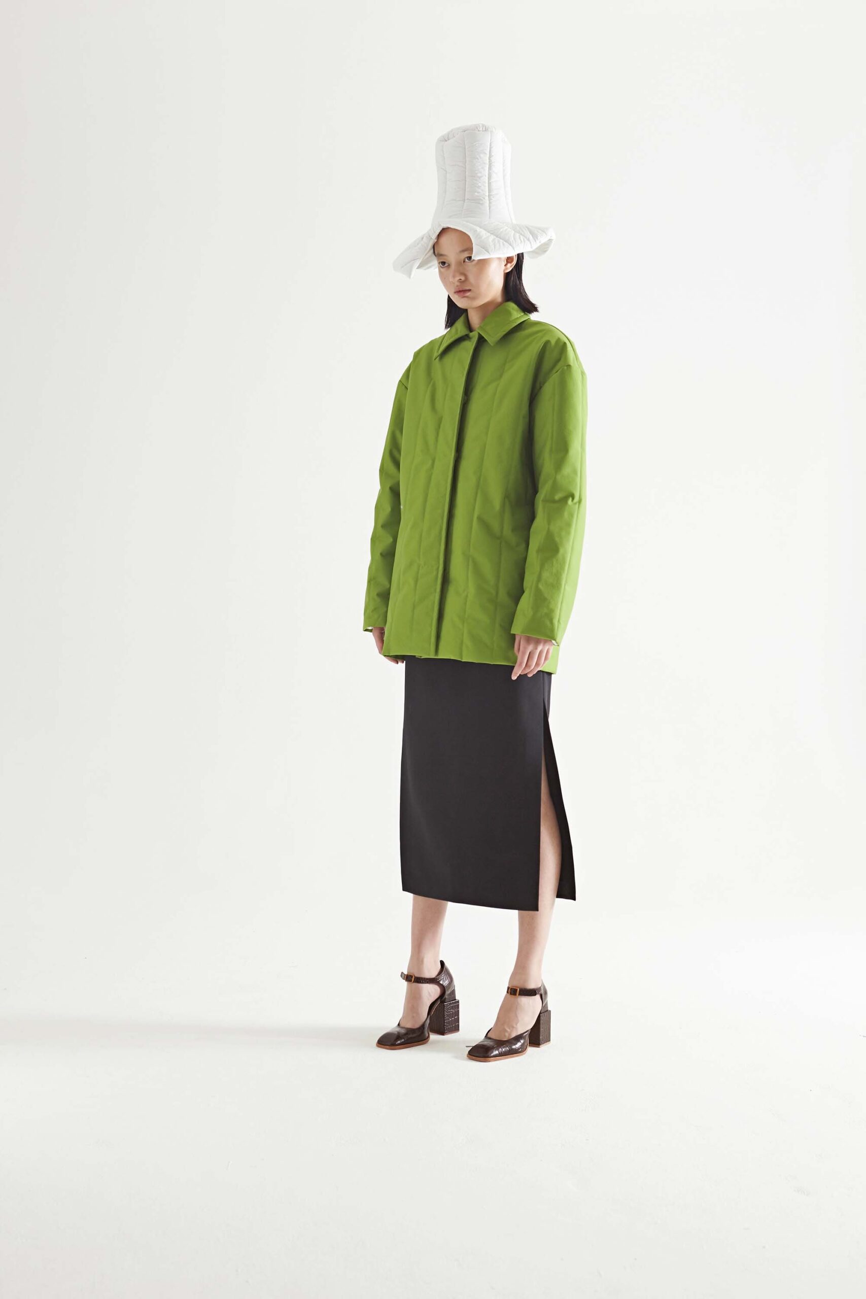 green relaxed jacket black midi skirt