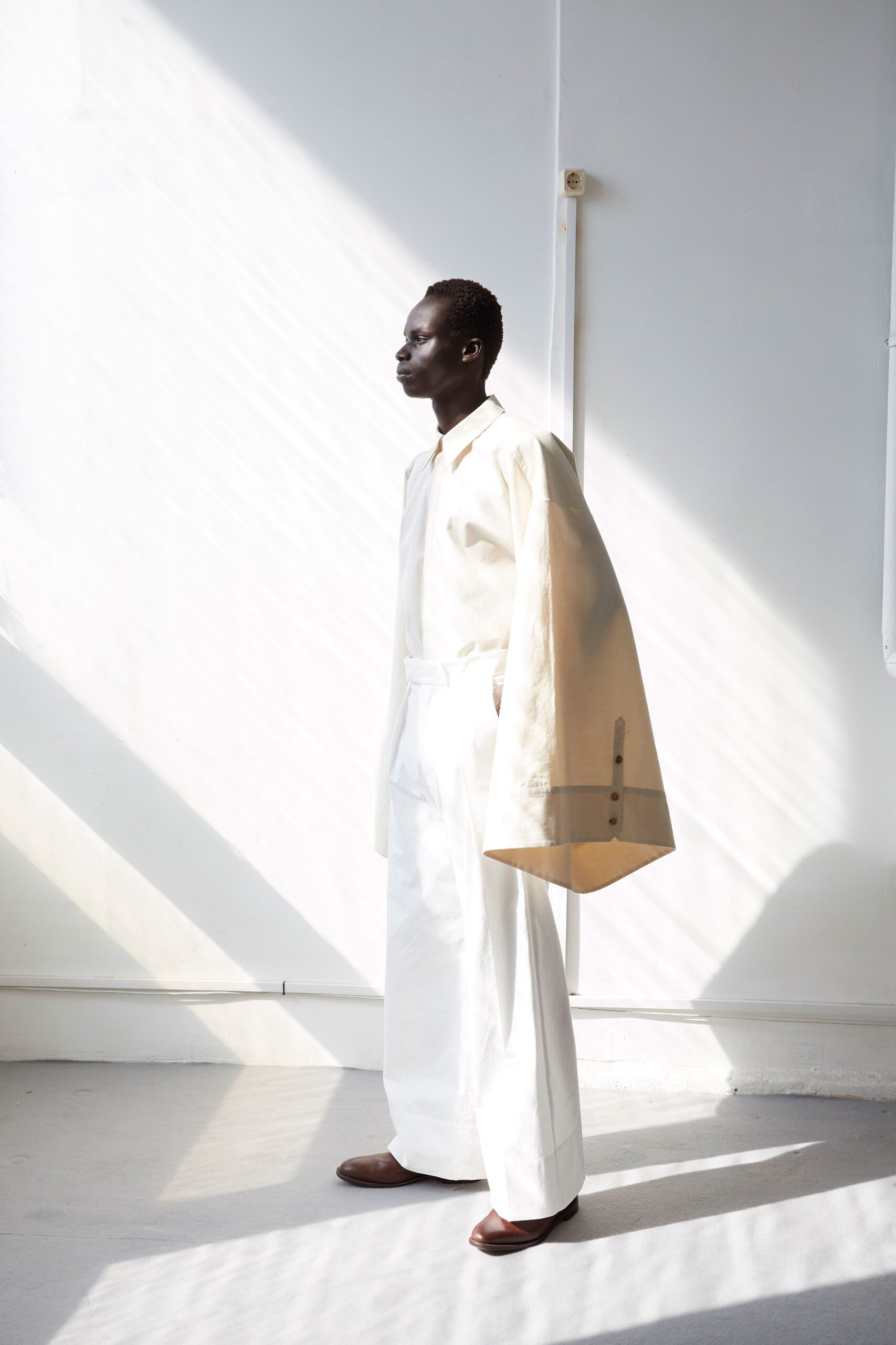 white relaxed shirt and pants