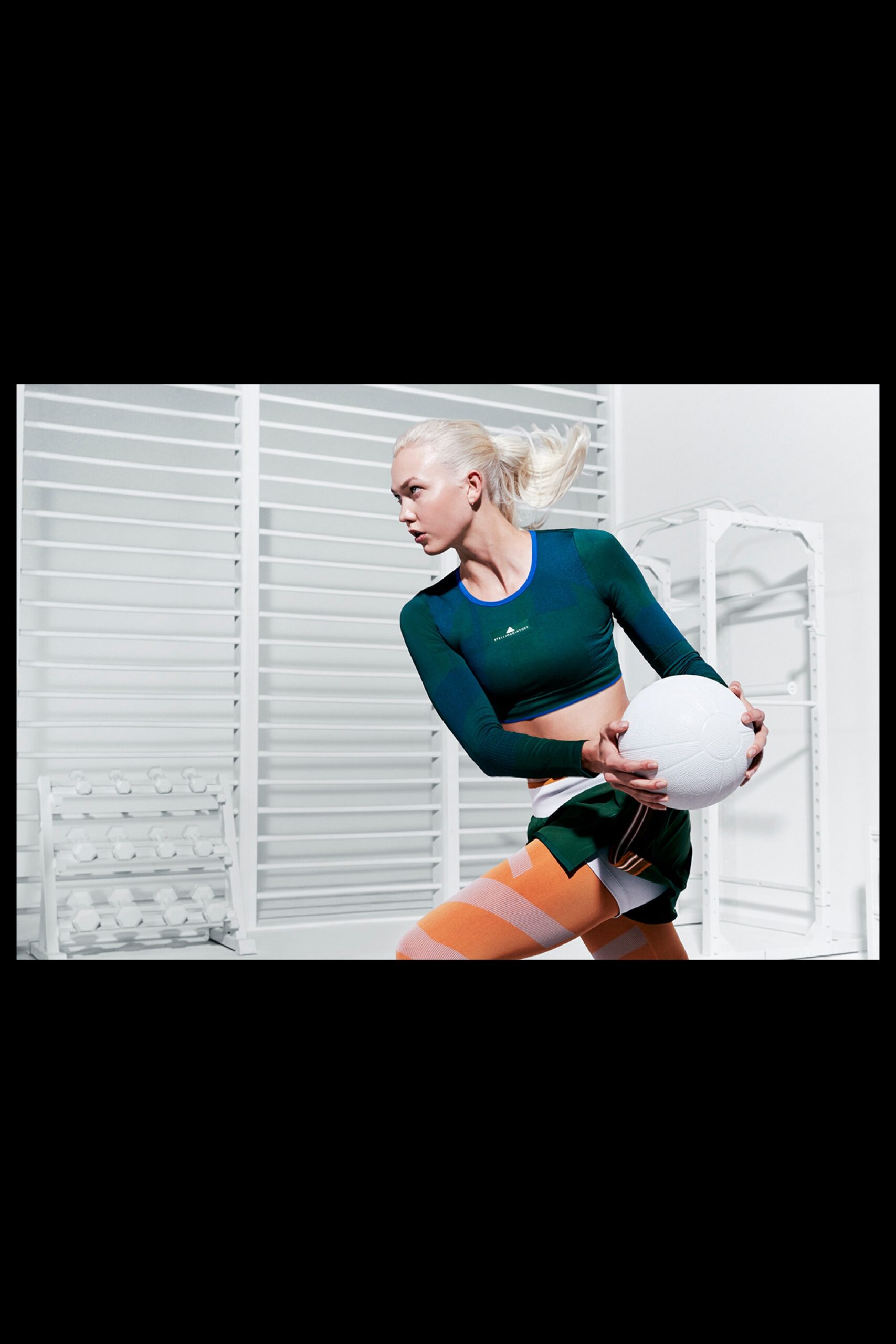 blue green fitted top and color-blocked shorts