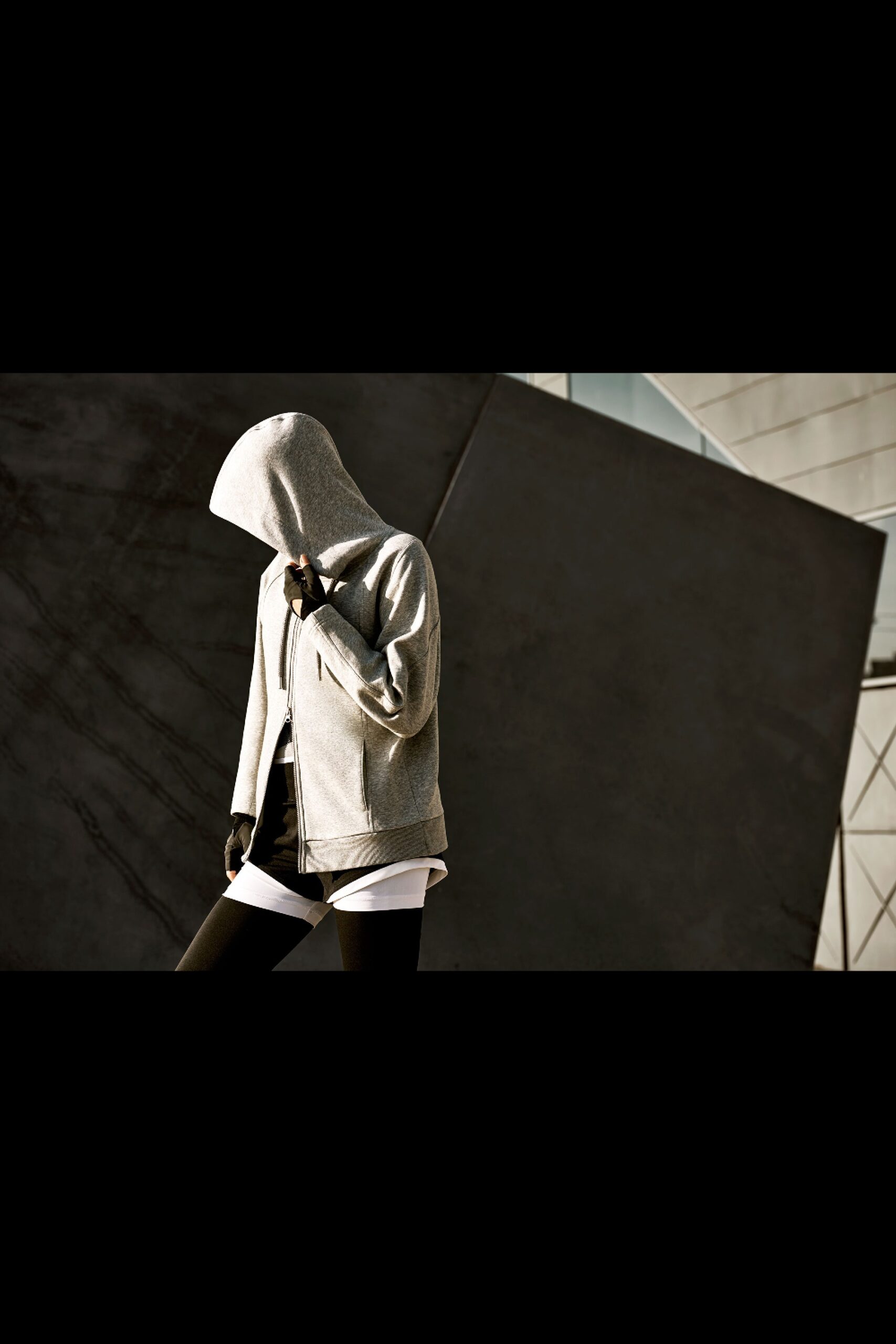 gray hoodie with black leggings