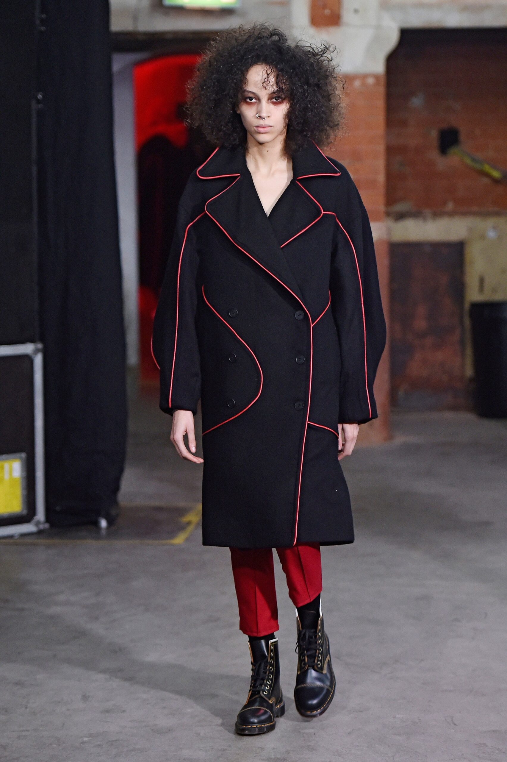 black coat with red accents