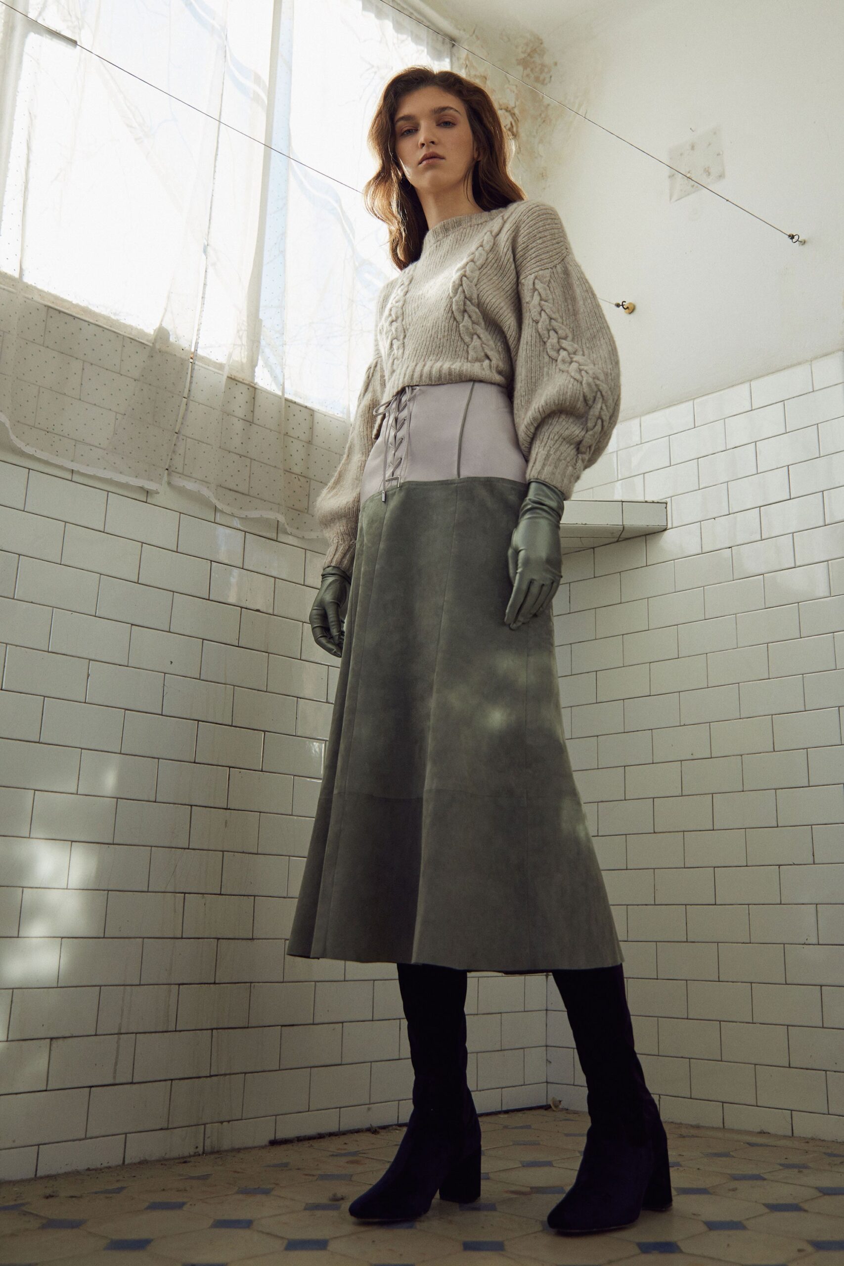 gray wool sweater and green suede skirt