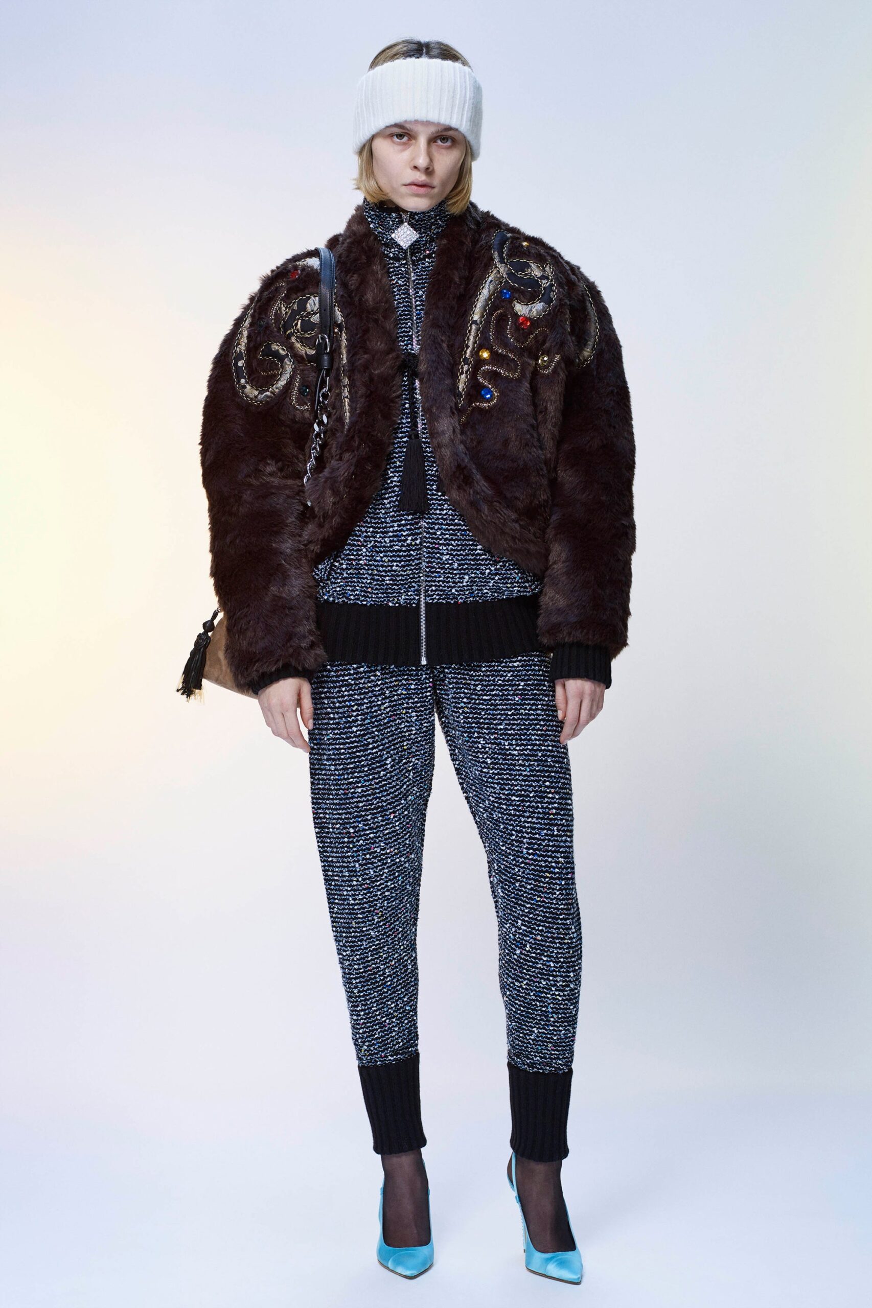 brown faux-fur jacket with blue shoes