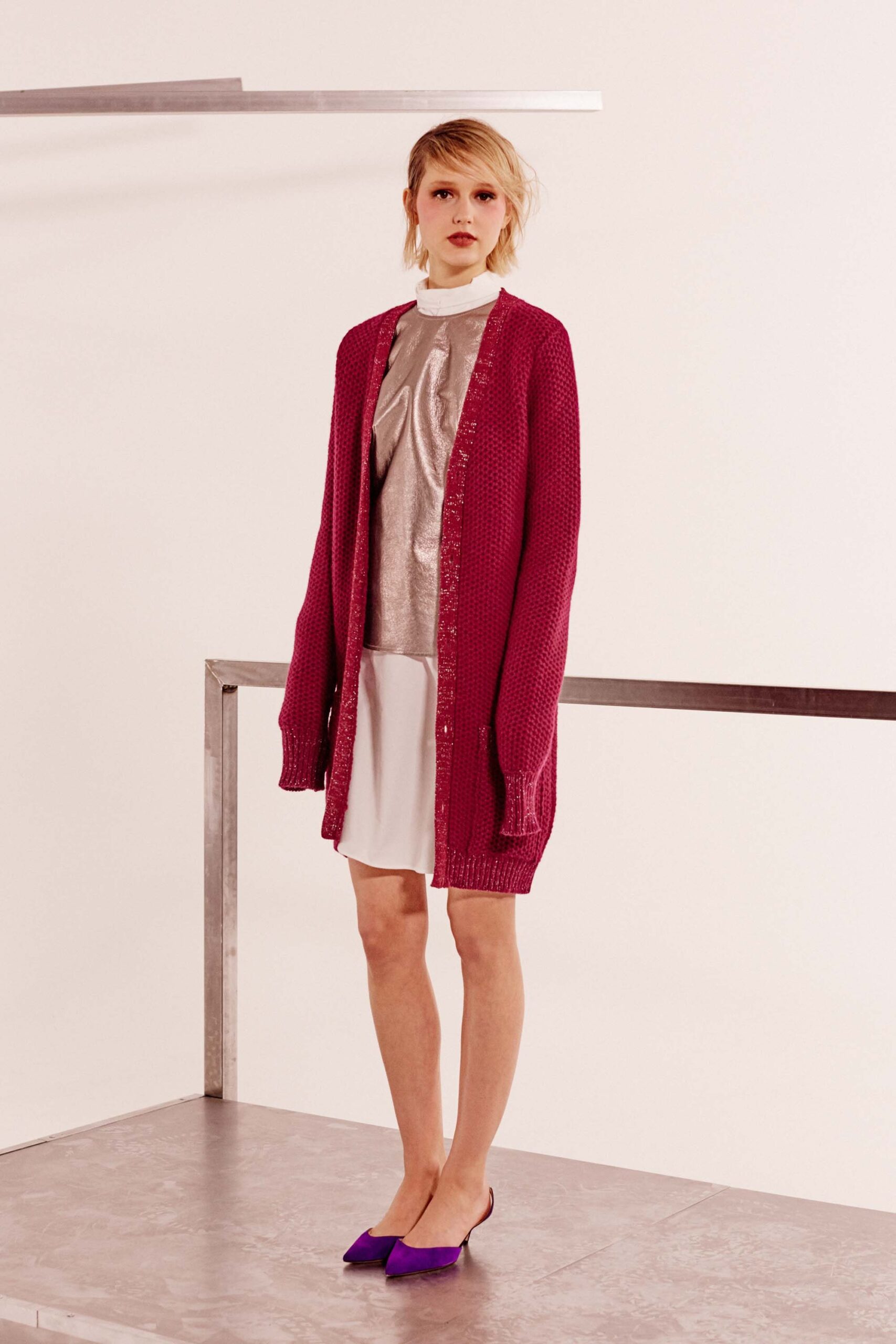 pink oversized cardigan with white mini dress