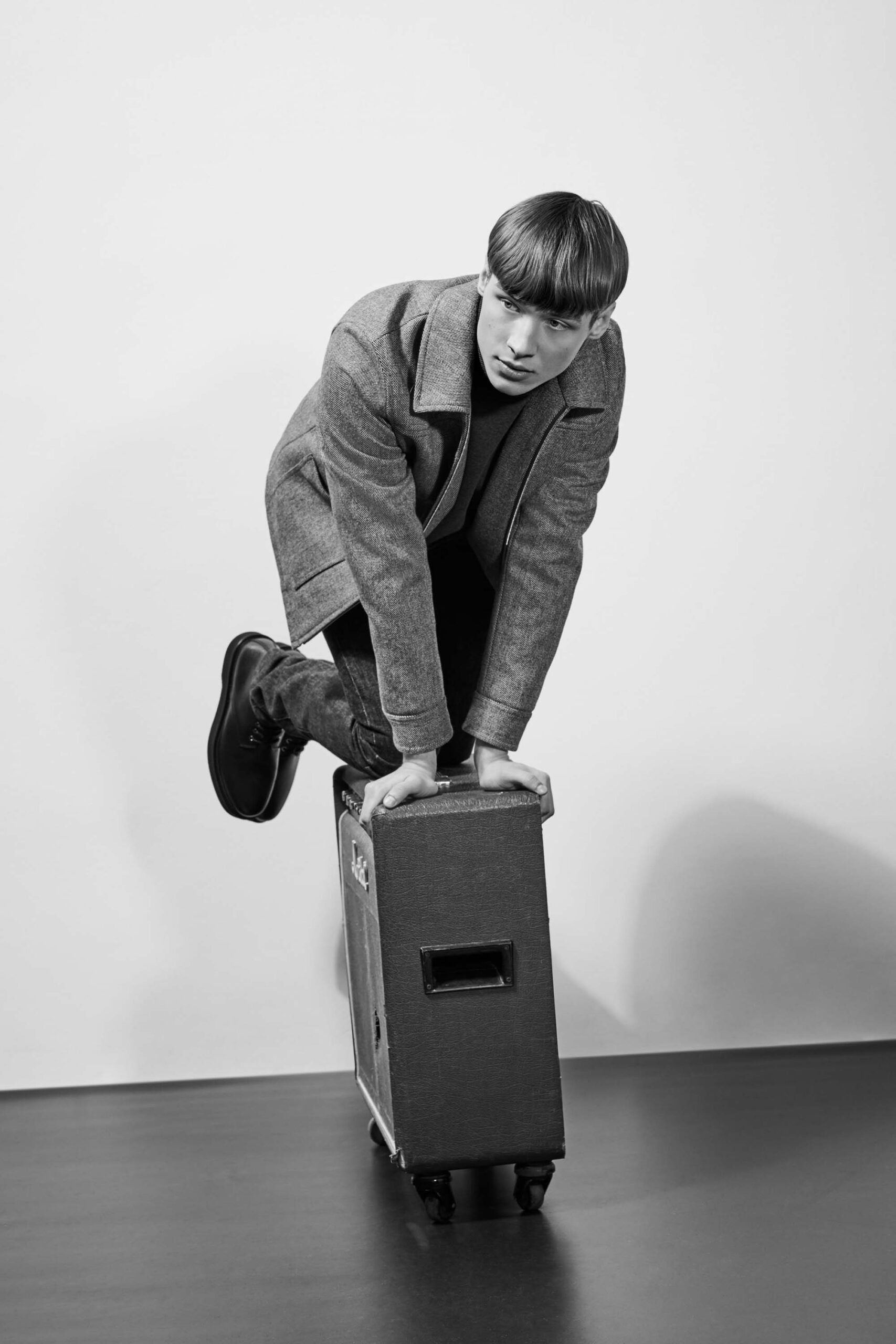gray wool fitted coat and black pants