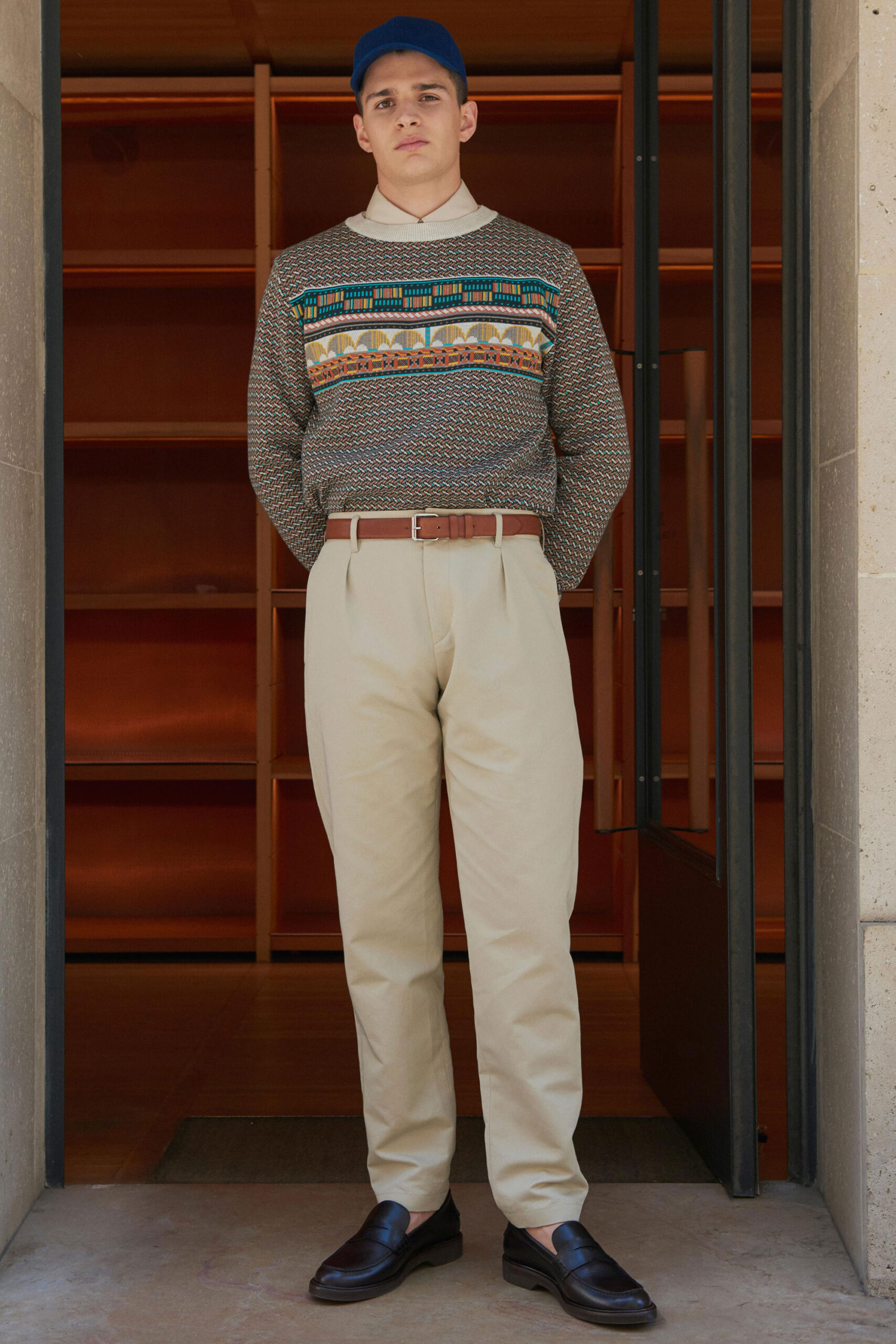 relaxed patterned sweater with tailored pants