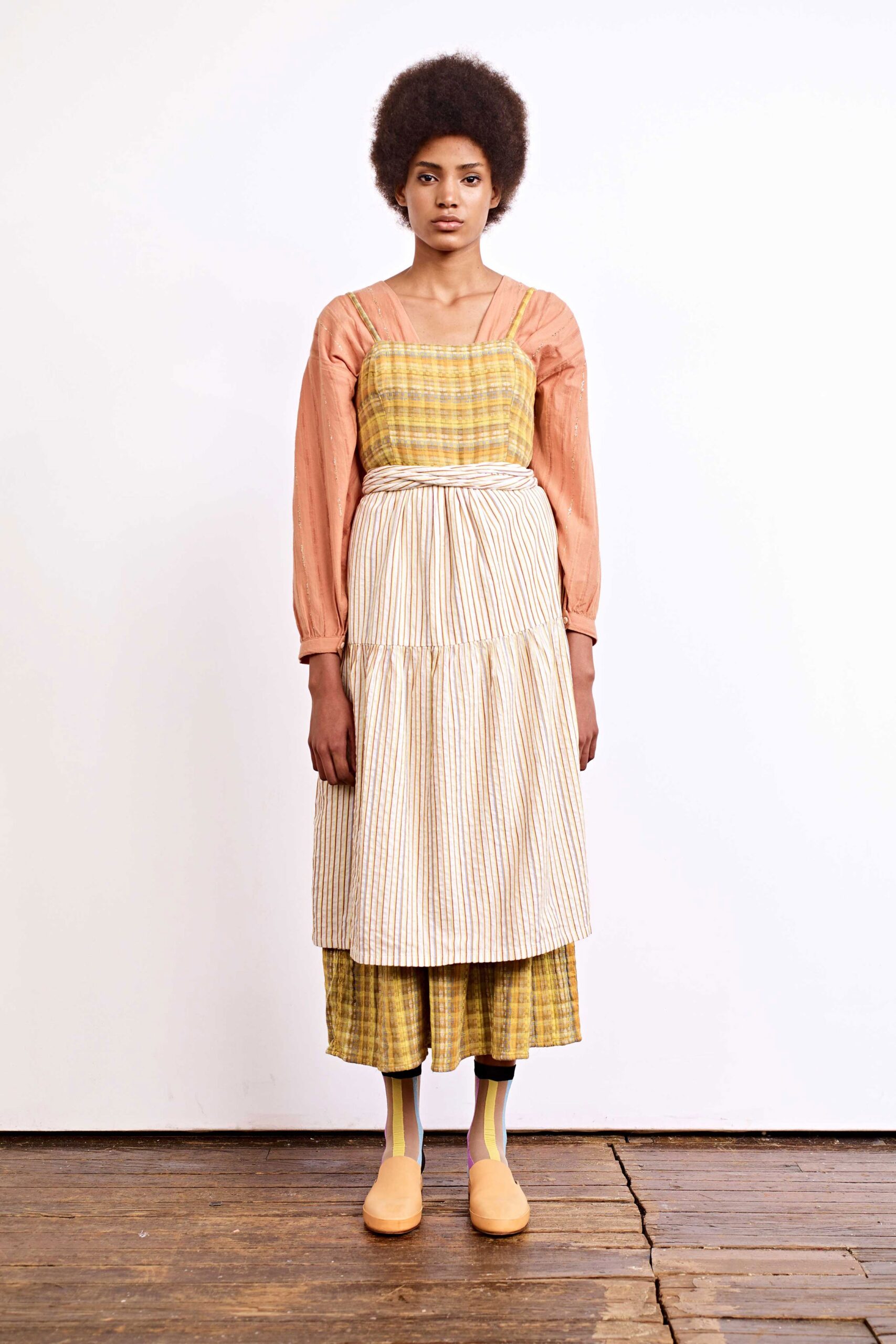 orange cotton long-sleeve collared relaxed pleated blouse