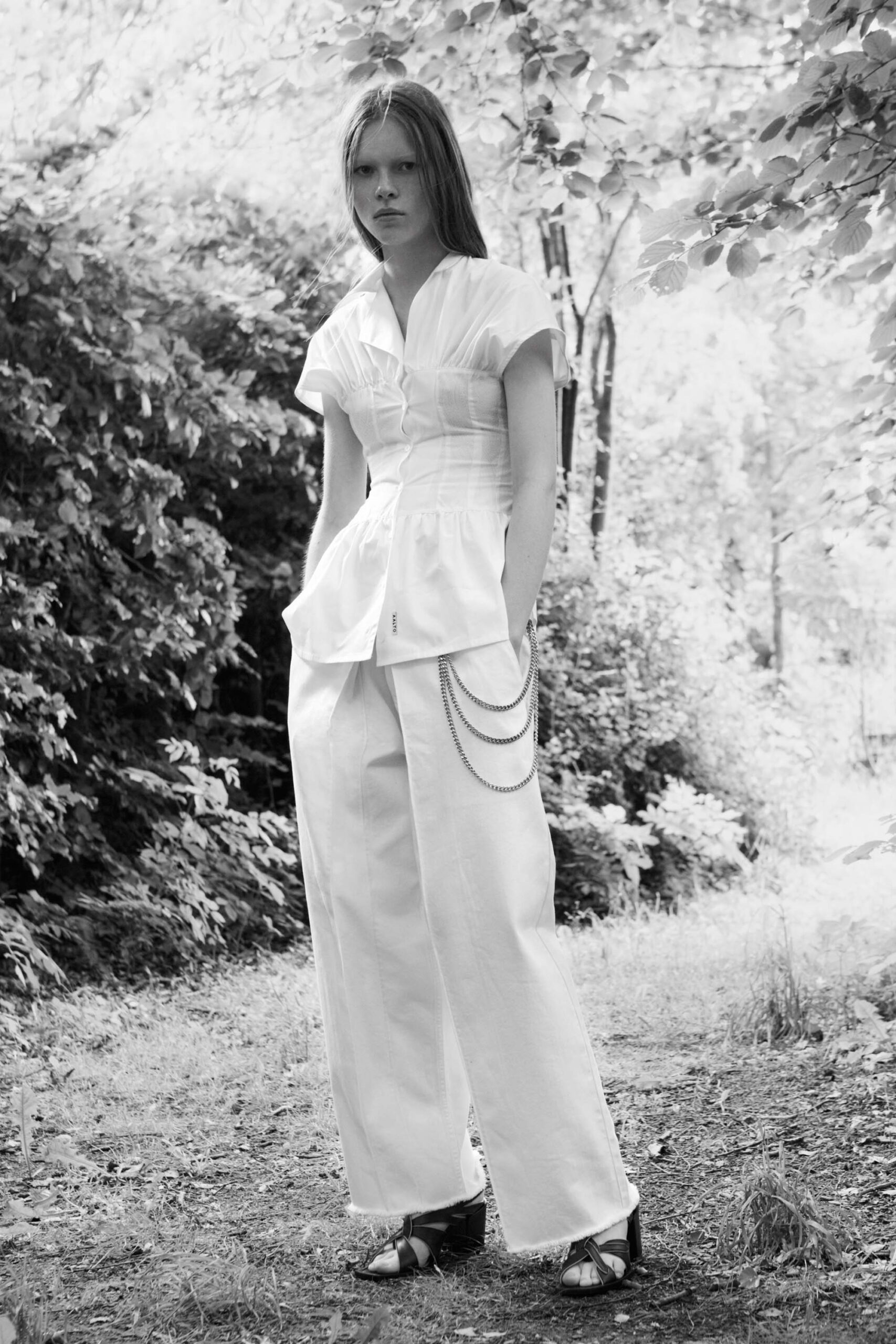 white fitted top and relaxed pants