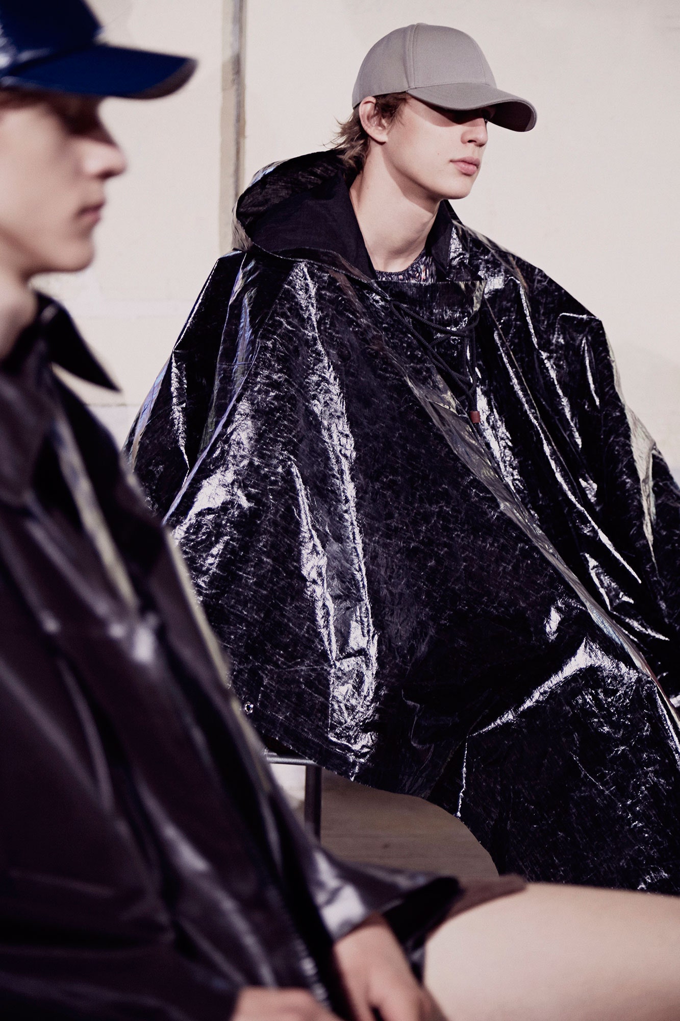 black vinyl sleeveless hooded relaxed layered shiny poncho