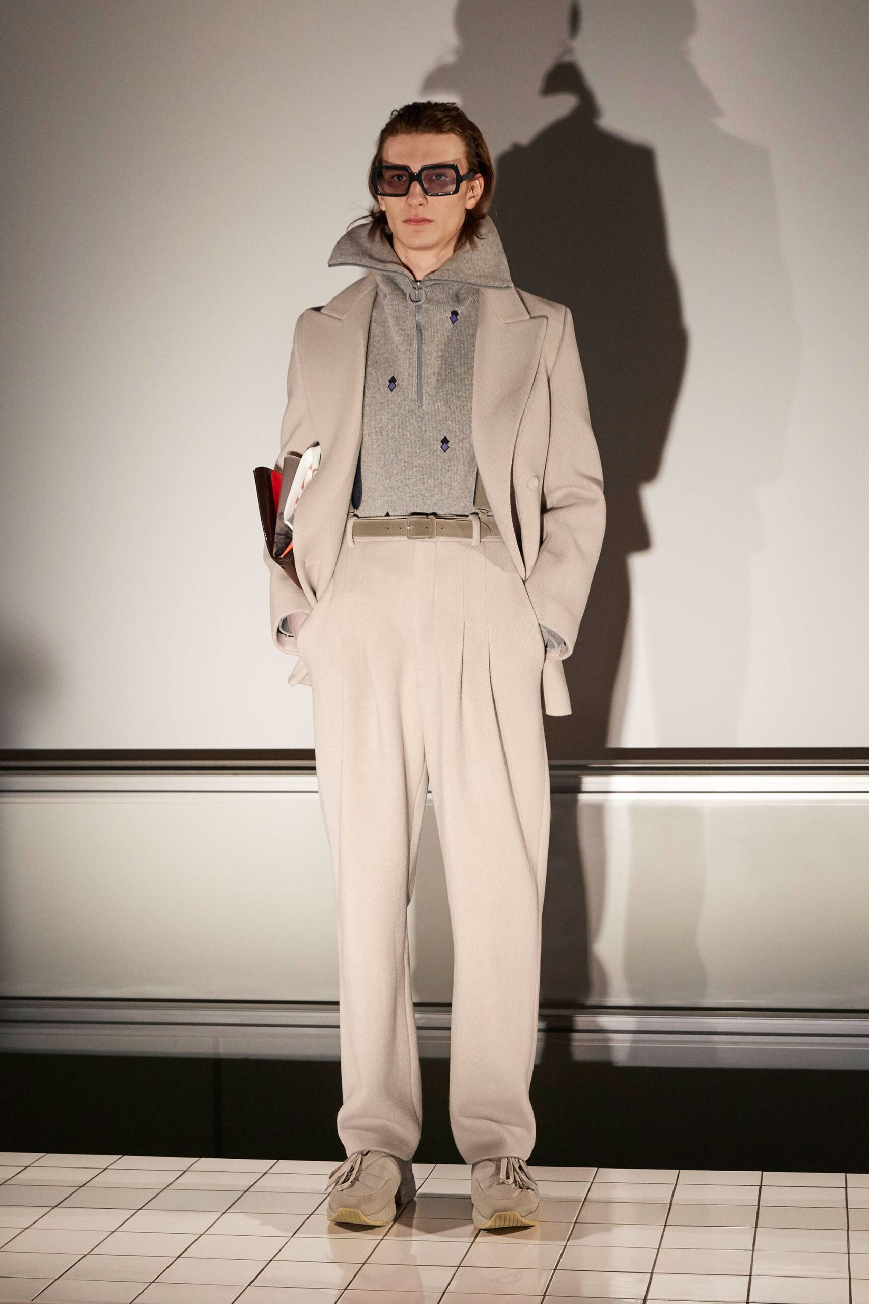 beige tailored blazer with gray hoodie