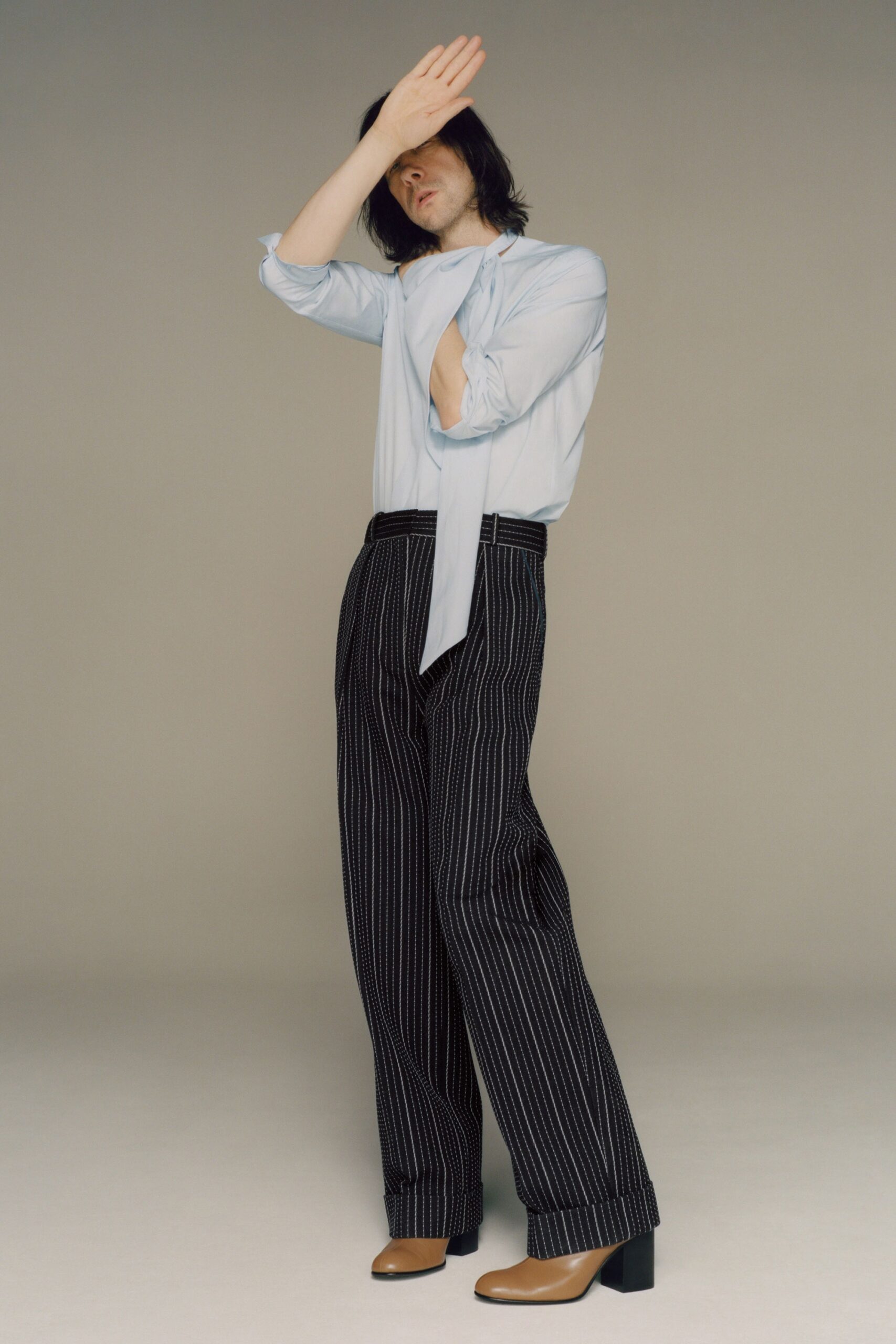 light blue relaxed shirt with striped pants
