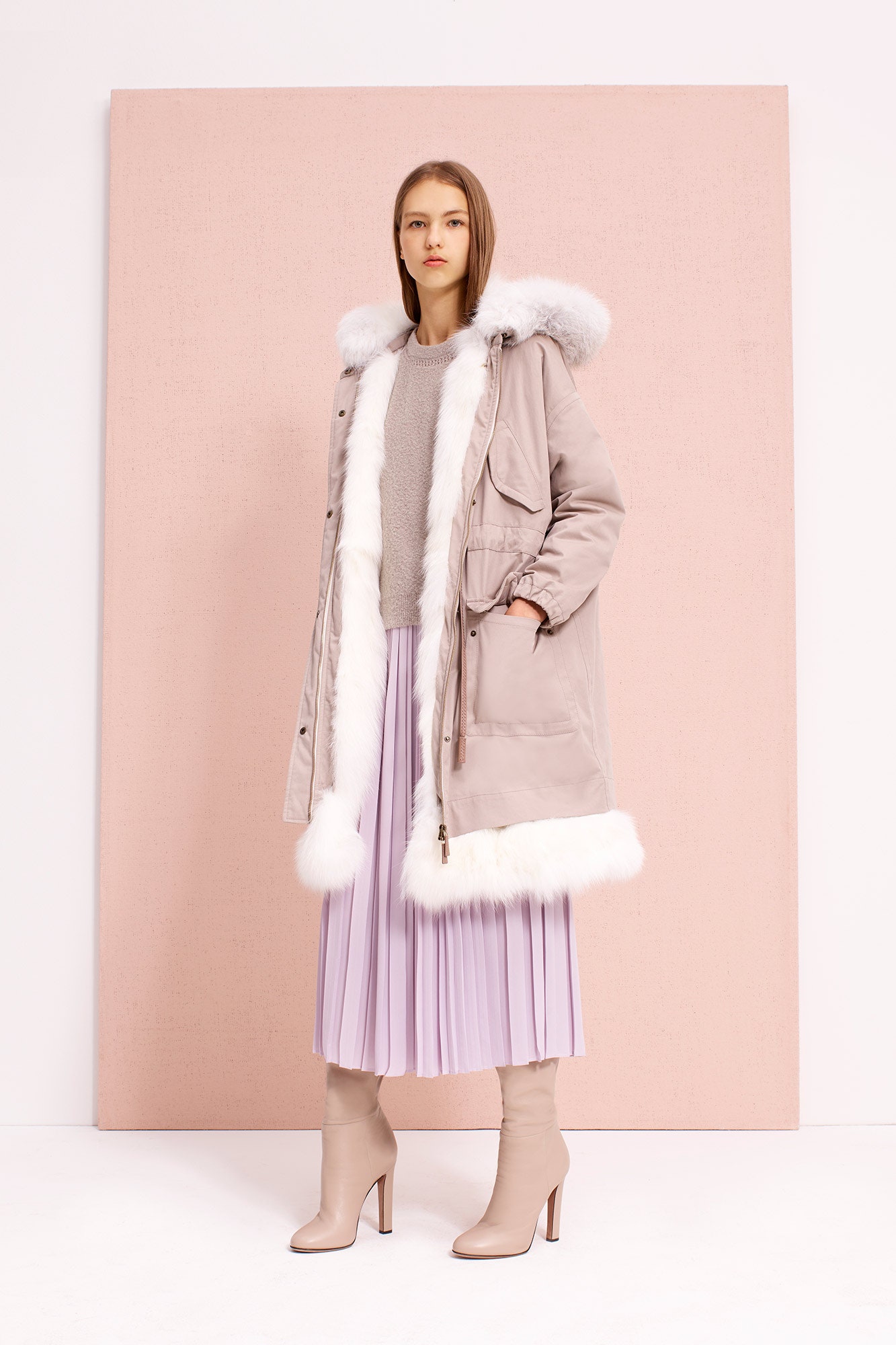 beige parka gray sweater pink pleated skirt