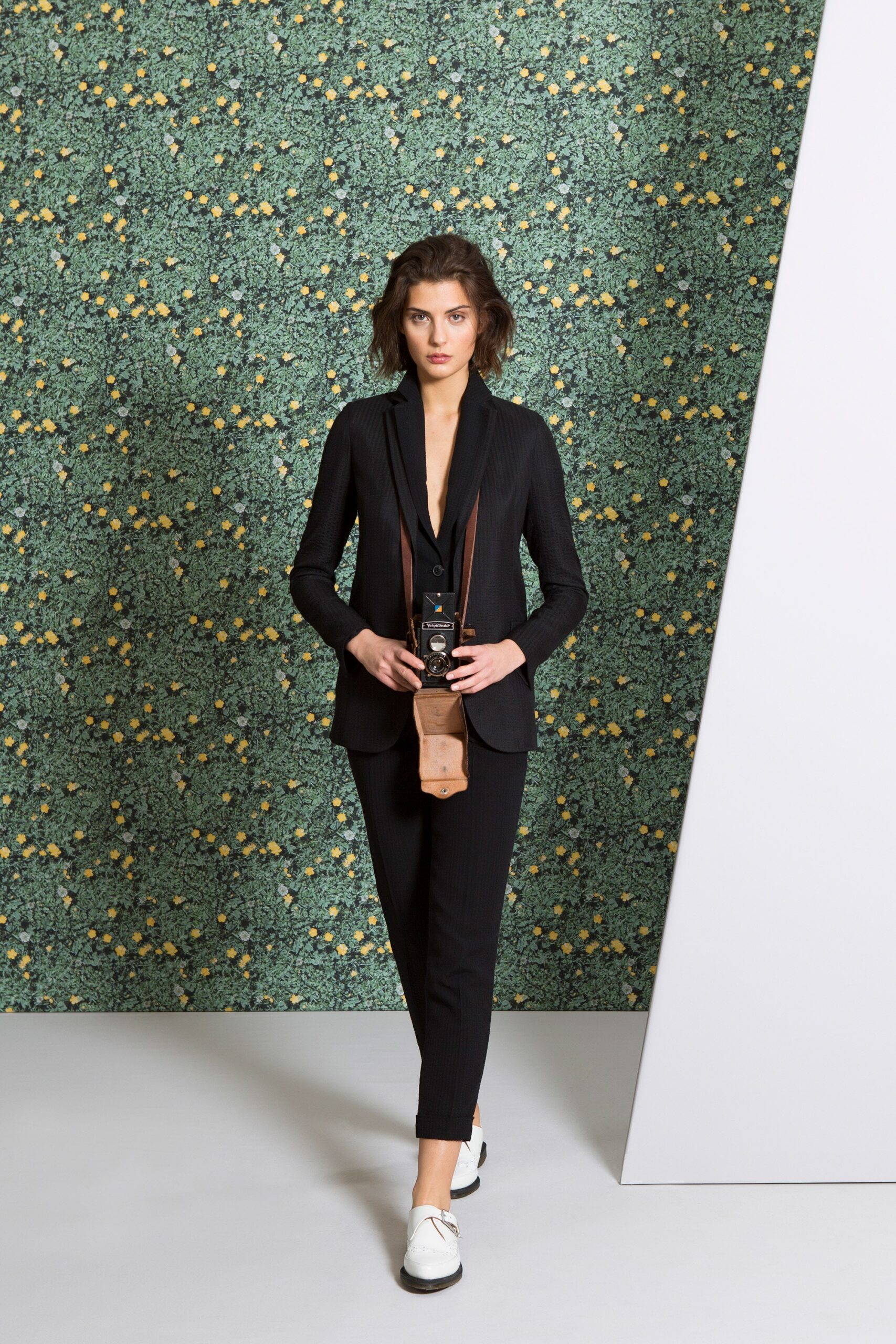 black tailored blazer with slim pants