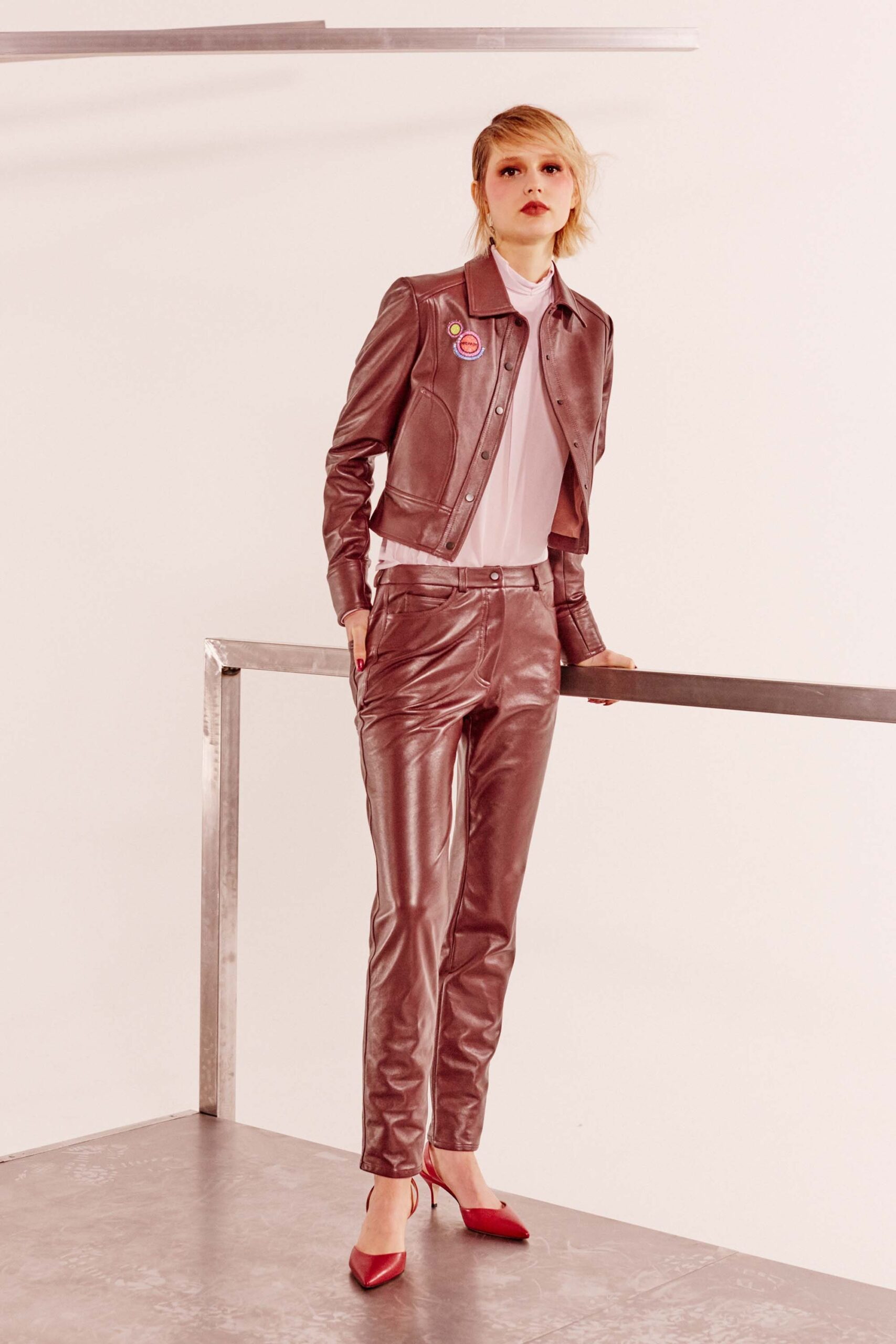 brown leather jacket with fitted shirt