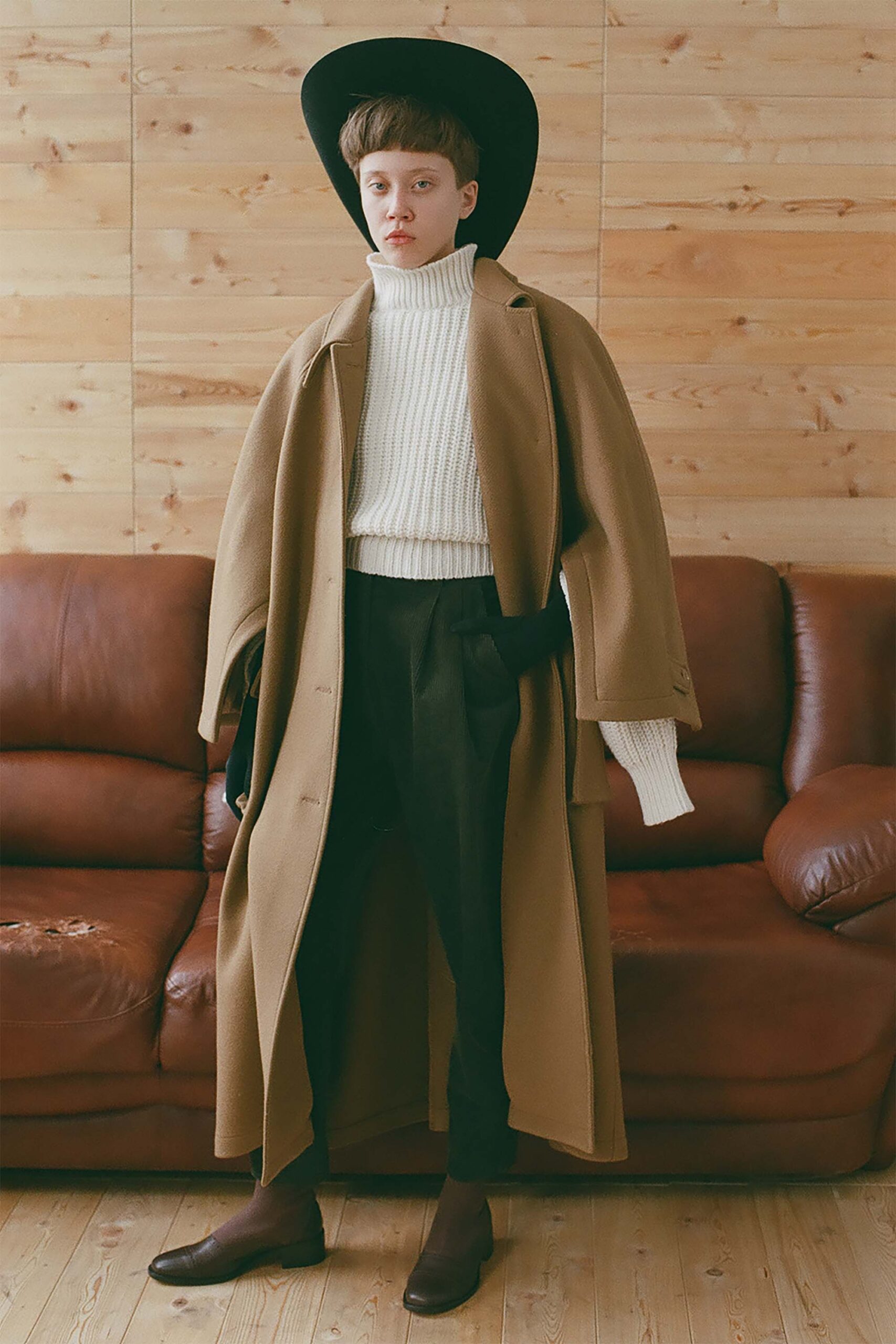 brown wool coat with white sweater