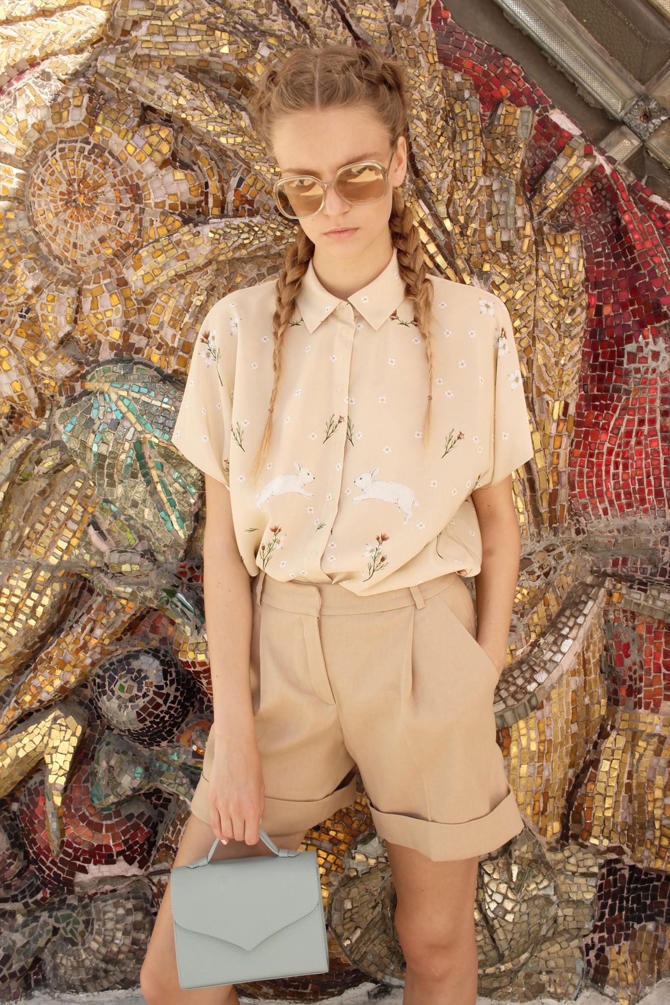beige printed shirt with tan shorts