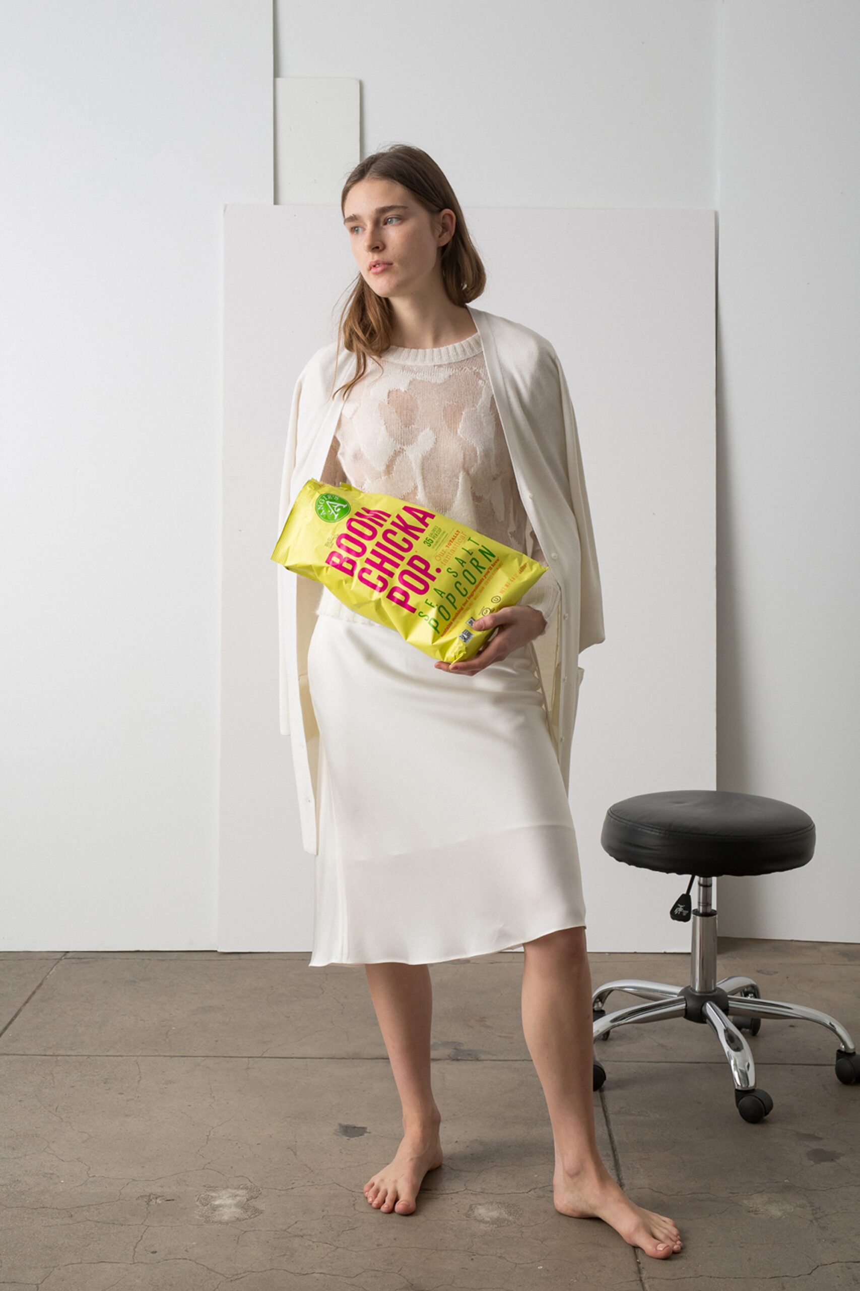 white silk sleeveless v-neck fitted straight-leg flowing dress