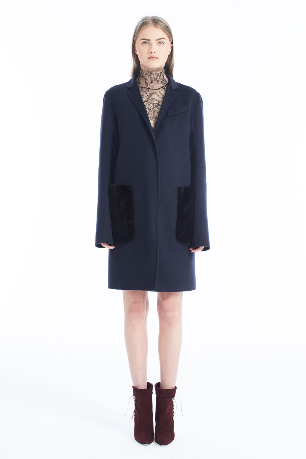 navy coat with lace blouse