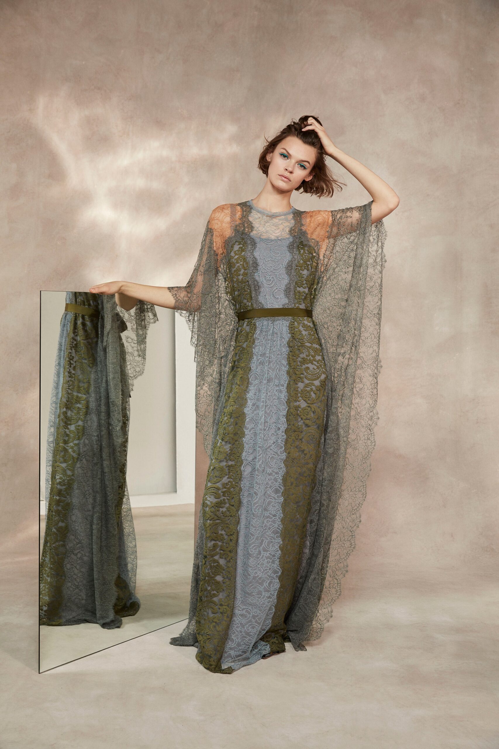 gray lace gown with cape