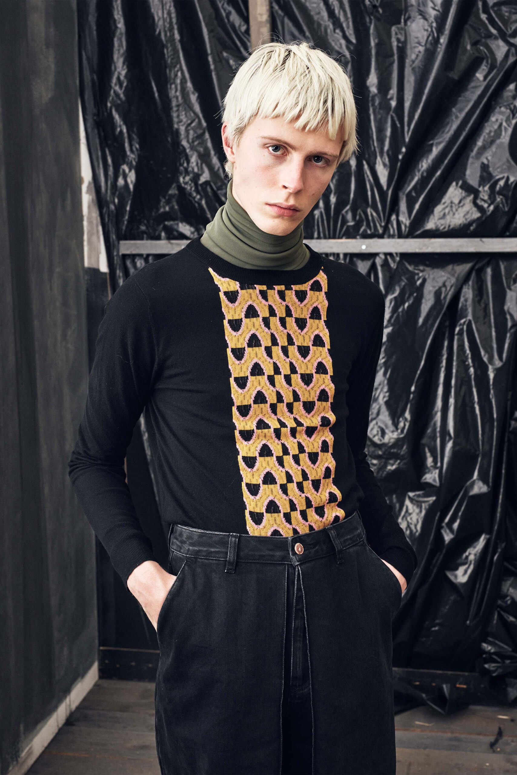 black fitted top and tailored pants