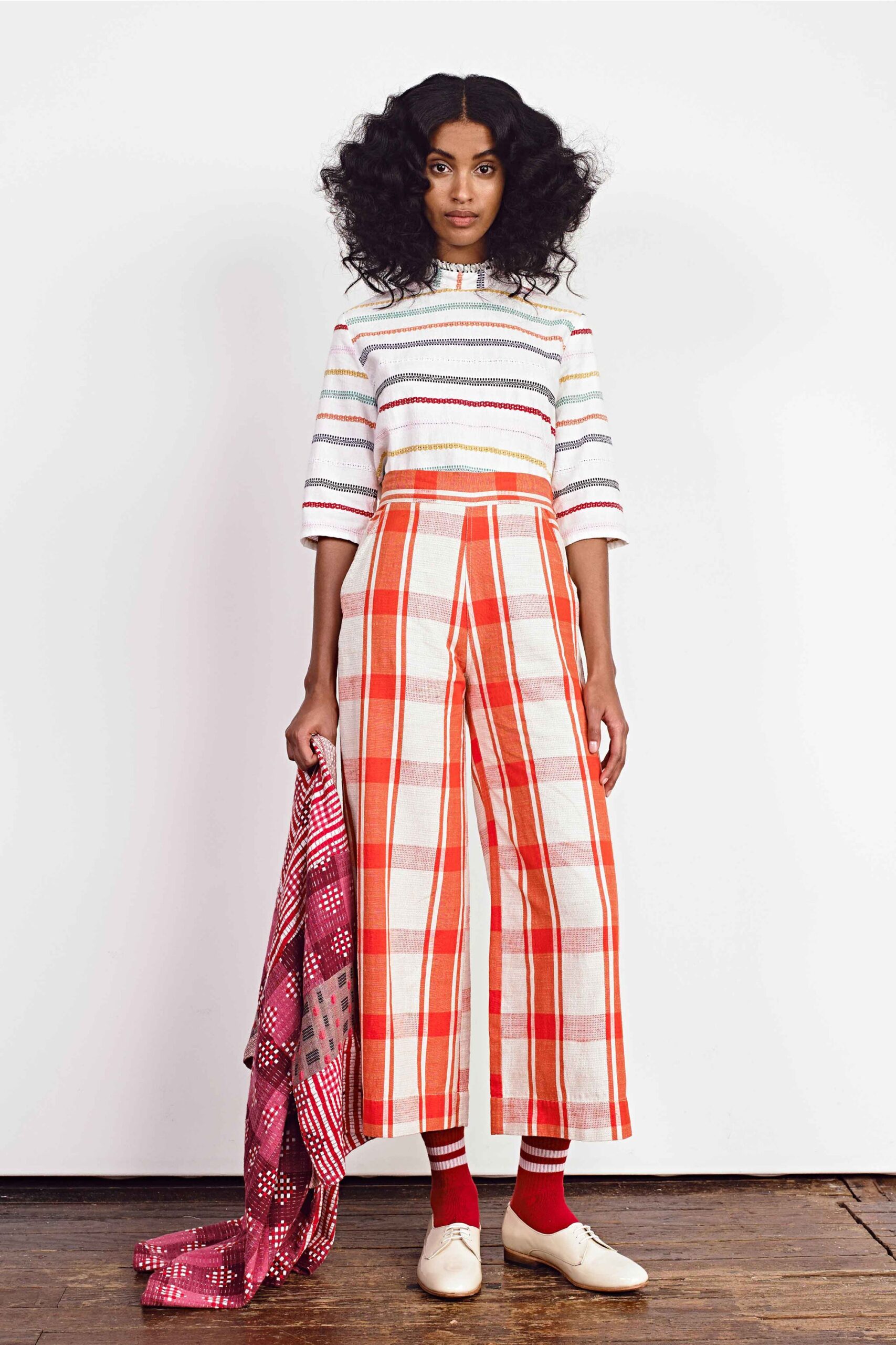 relaxed striped top with checked pants