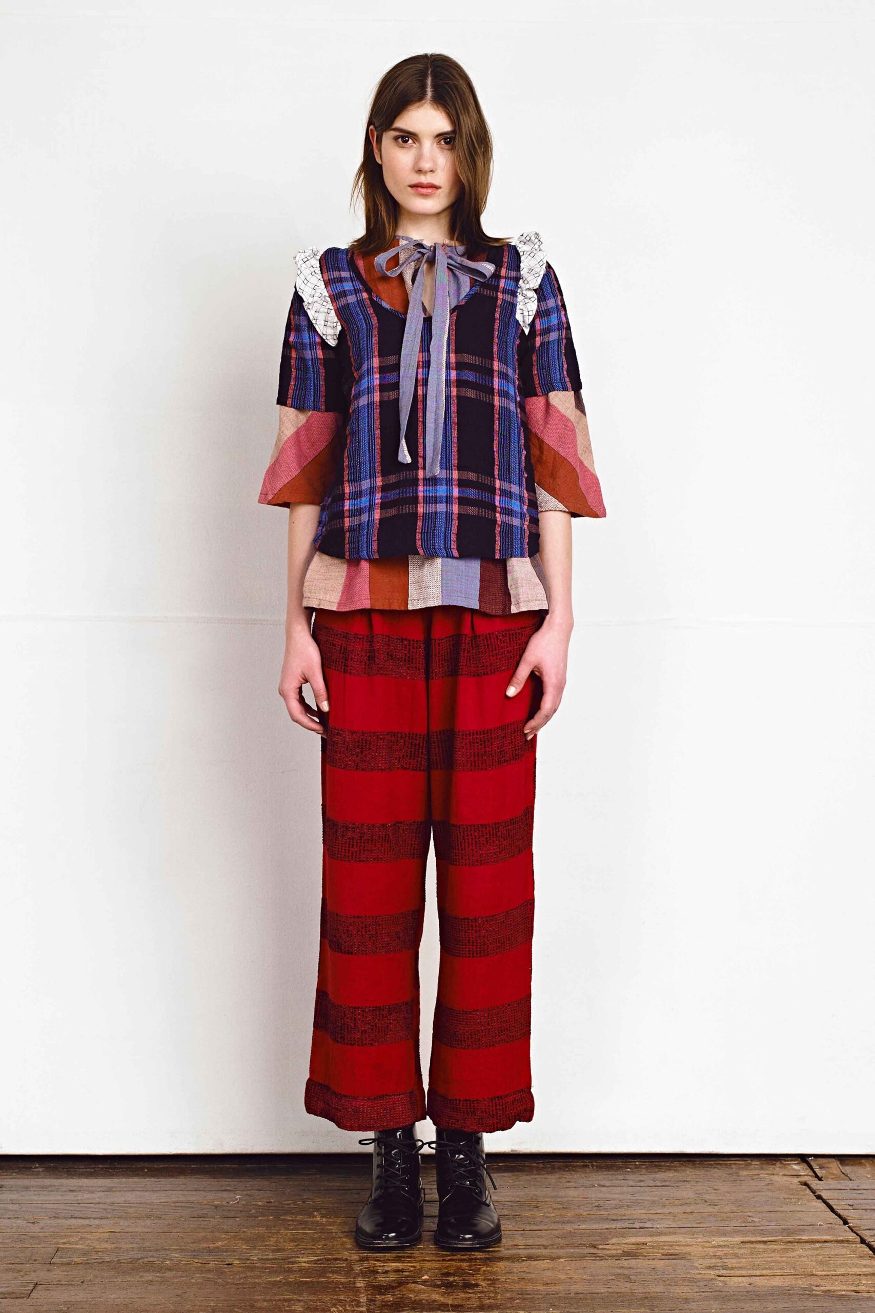 checked top with striped pants