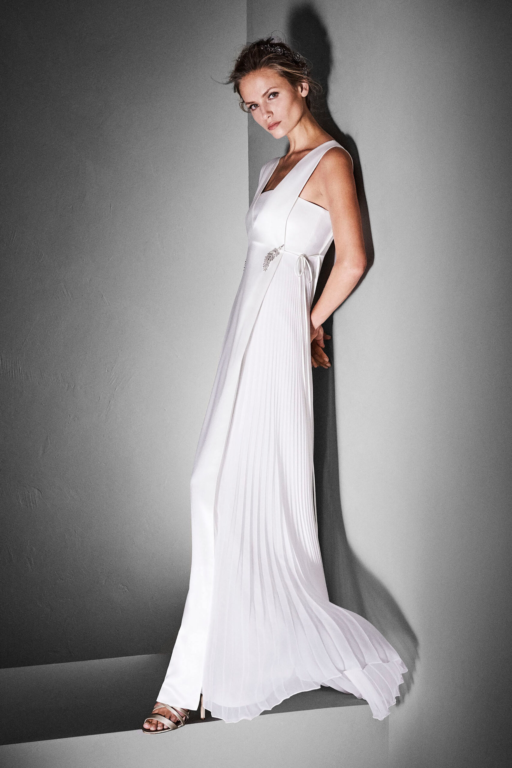 white silk sleeveless gown