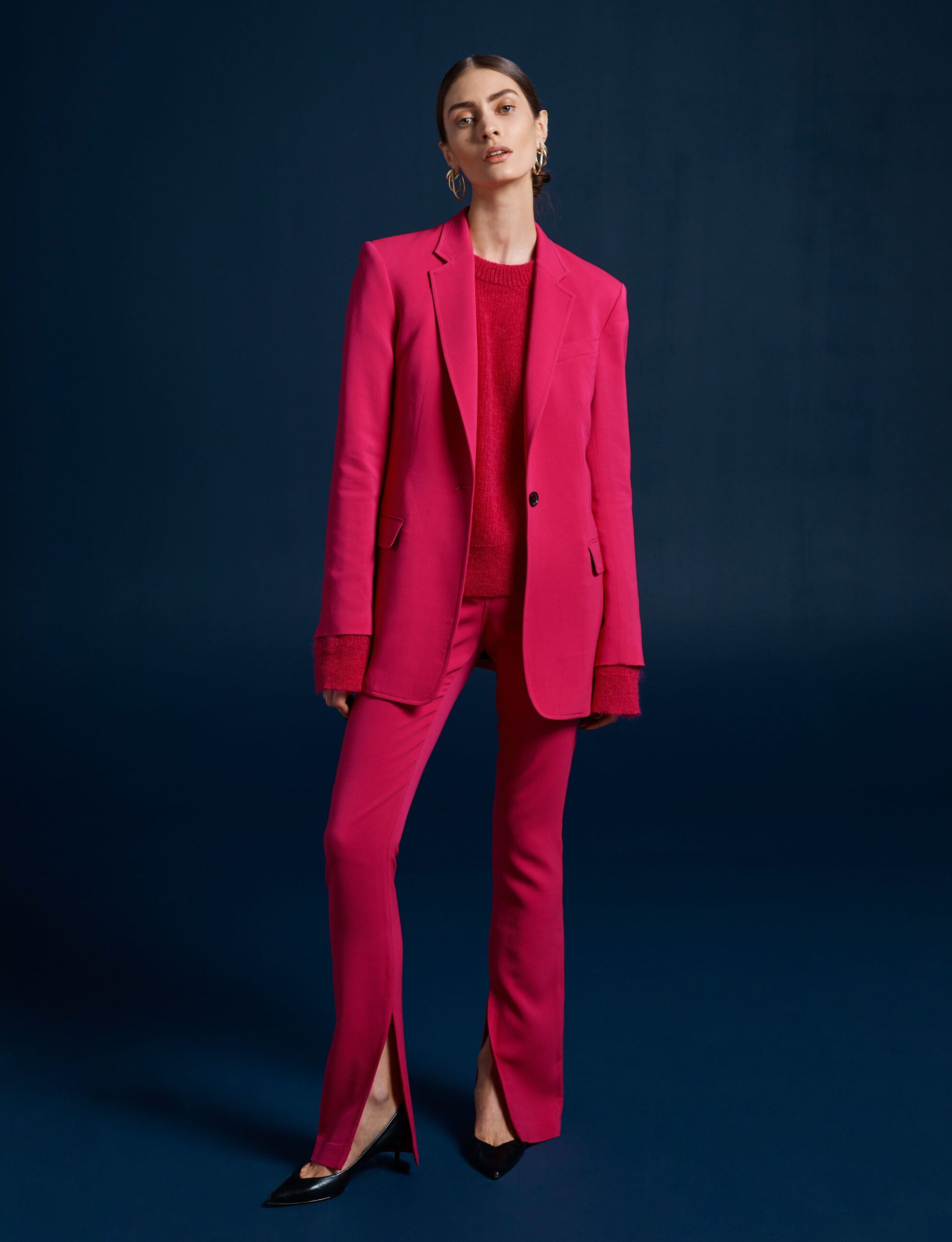 pink long-sleeve collared tailored suit