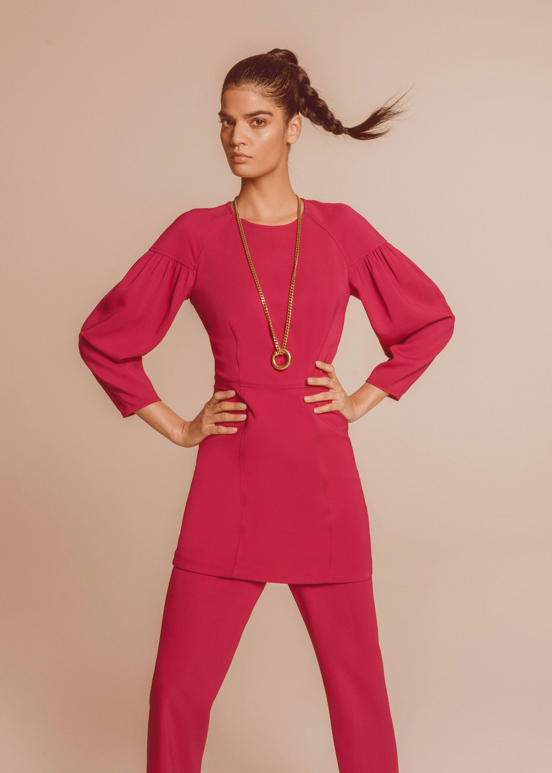 fitted pink silk top and pants